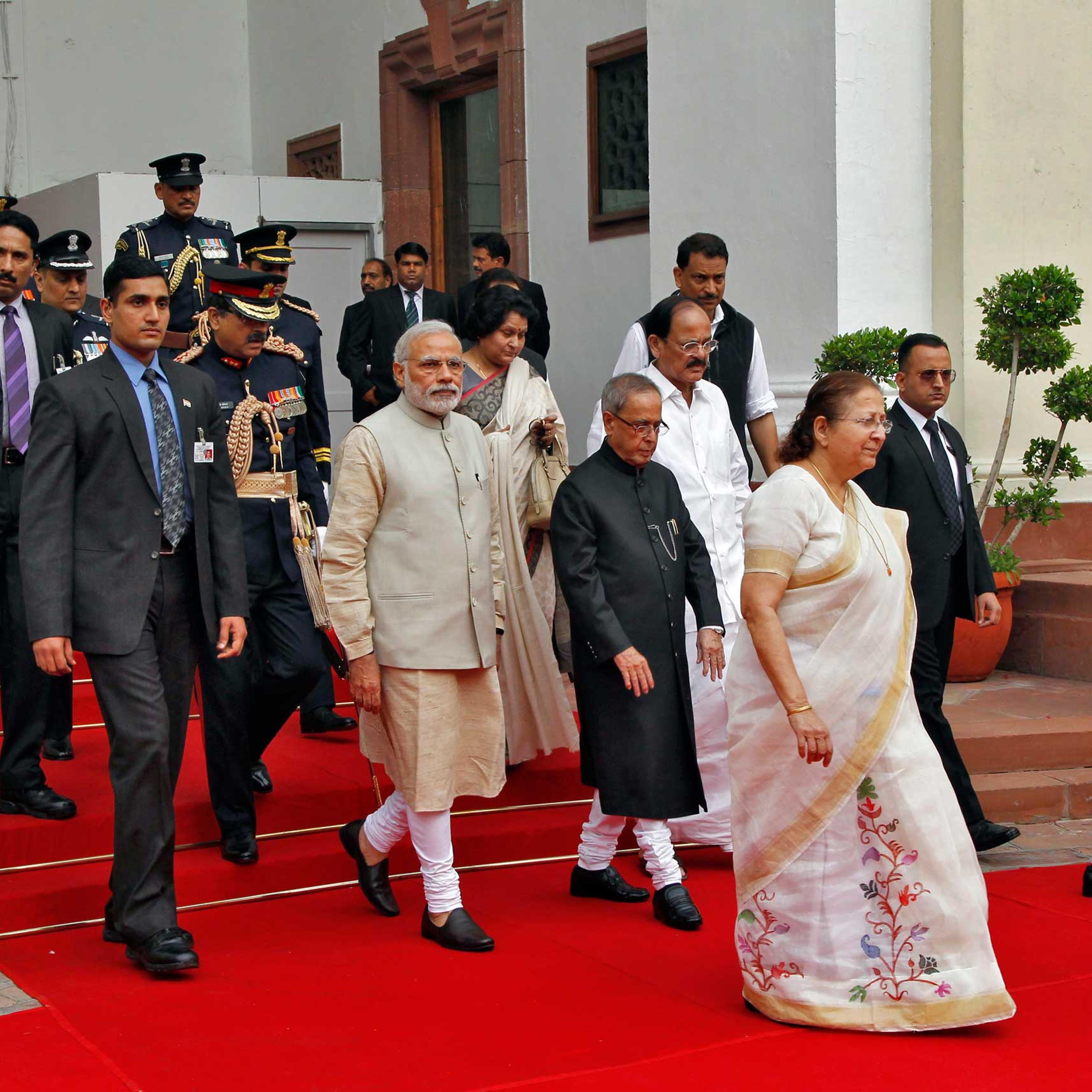 India's PM Modi, President Mukherjee, Lok Sabha speaker Mahajanand Vice President Ansari walk inside the parliament premises as they arrive to attend the first day of the budget session in New Delhi