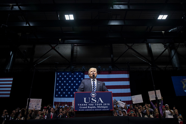 President-elect Donald Trump speaks at the DeltaPlex Arena, December 9, 2016 in Grand Rapids, Michigan.