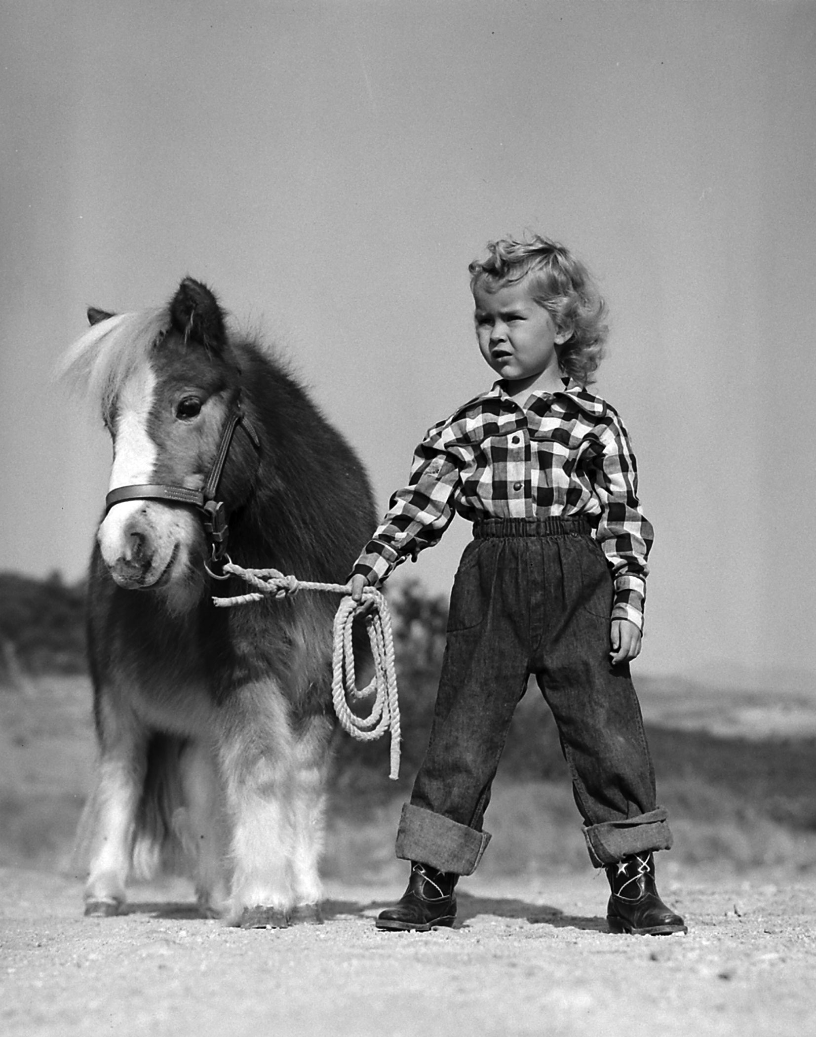 3-year-old cover girl Cynthia West with Chauncey.