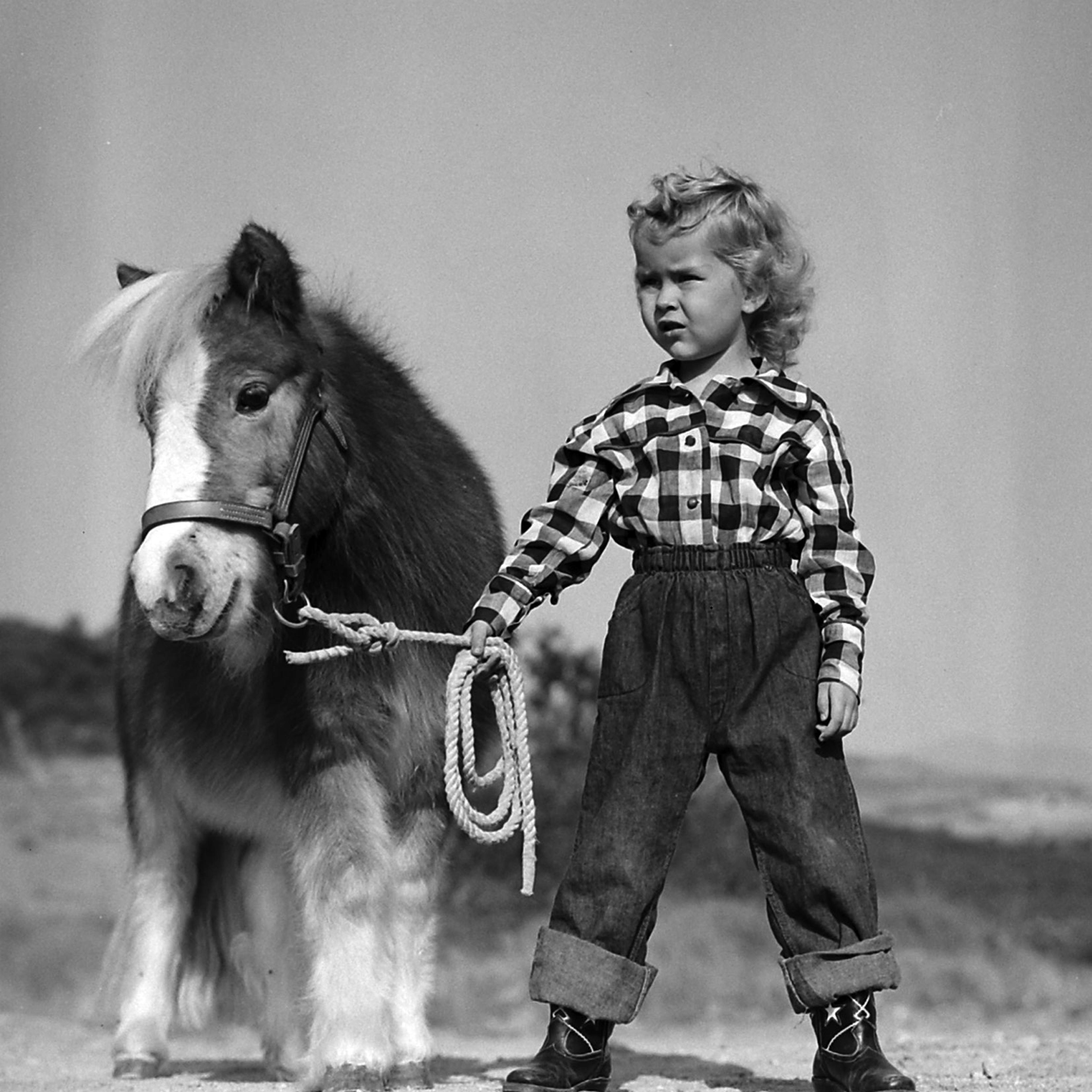 3-year-old cover girl Cynthia West with Chauncey.