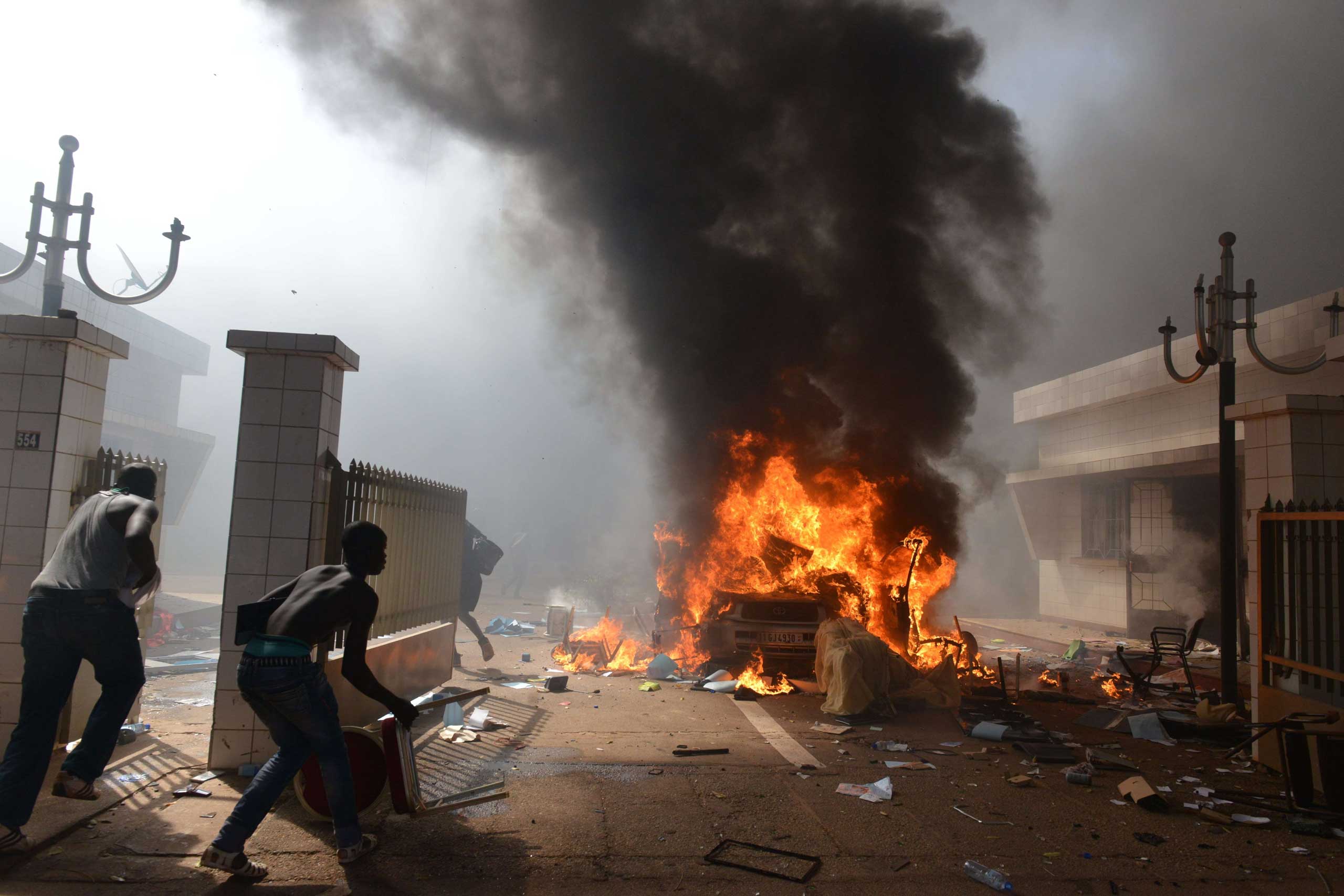 Prostestors enter the parliament in Ouagadougou on Oct. 30, 2014.