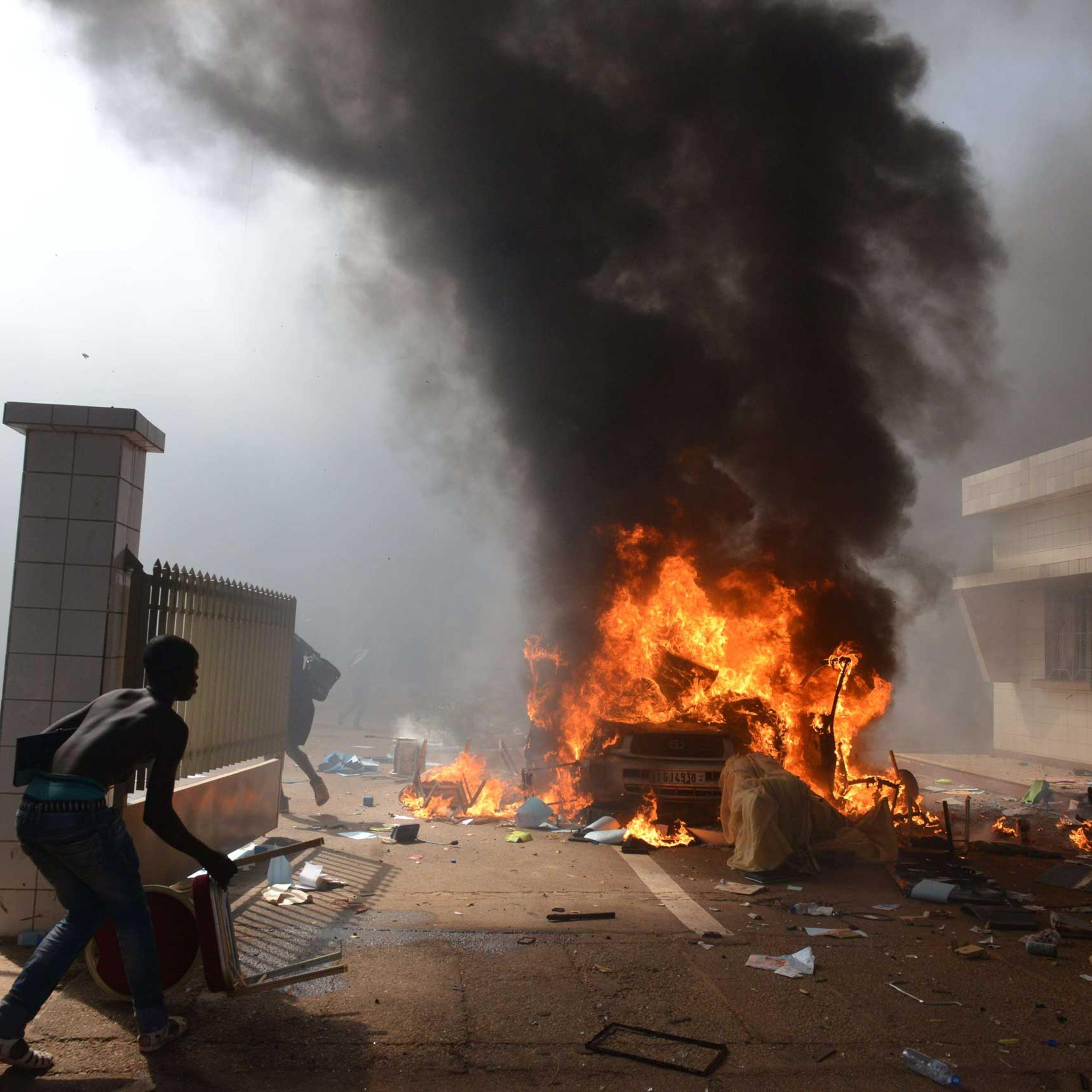 Prostestors enter the parliament in Ouagadougou on Oct. 30, 2014.