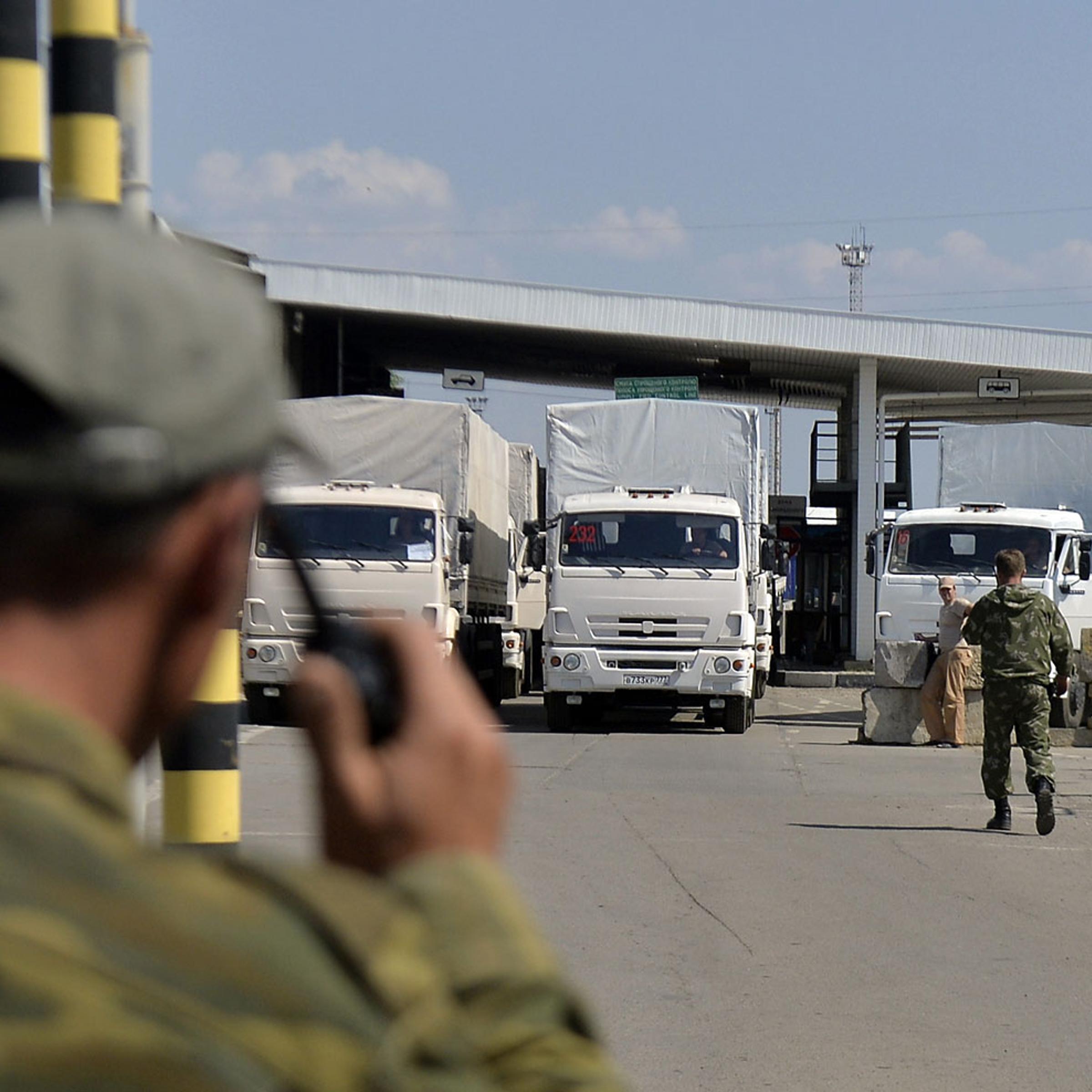 Russian aid convoy crosses border into Ukraine