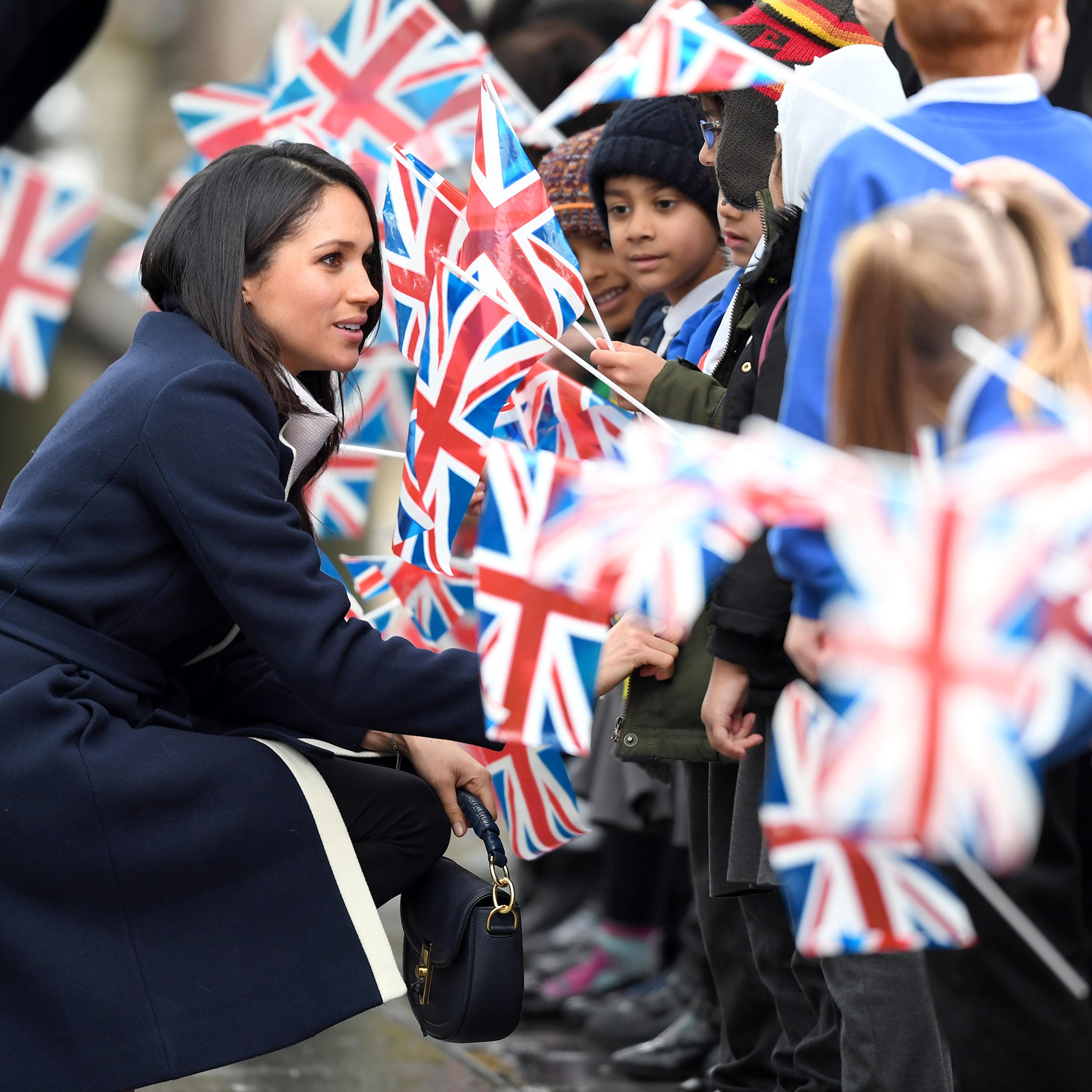 Meghan Markle and Prince Harry visit Millennium Point on March 8, 2018 in Birmingham, England.