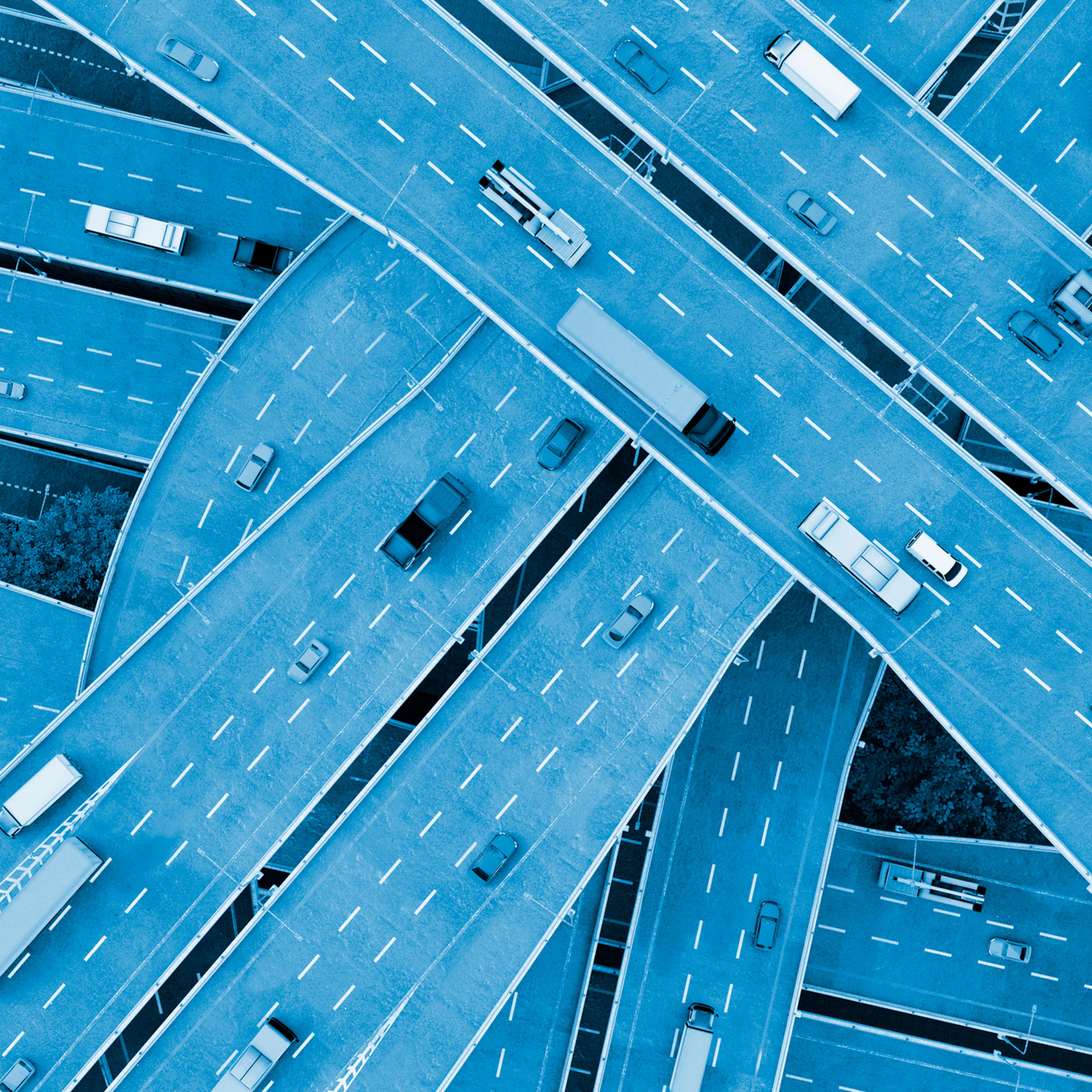 Concept of mobility in the city with cars driving on several roads