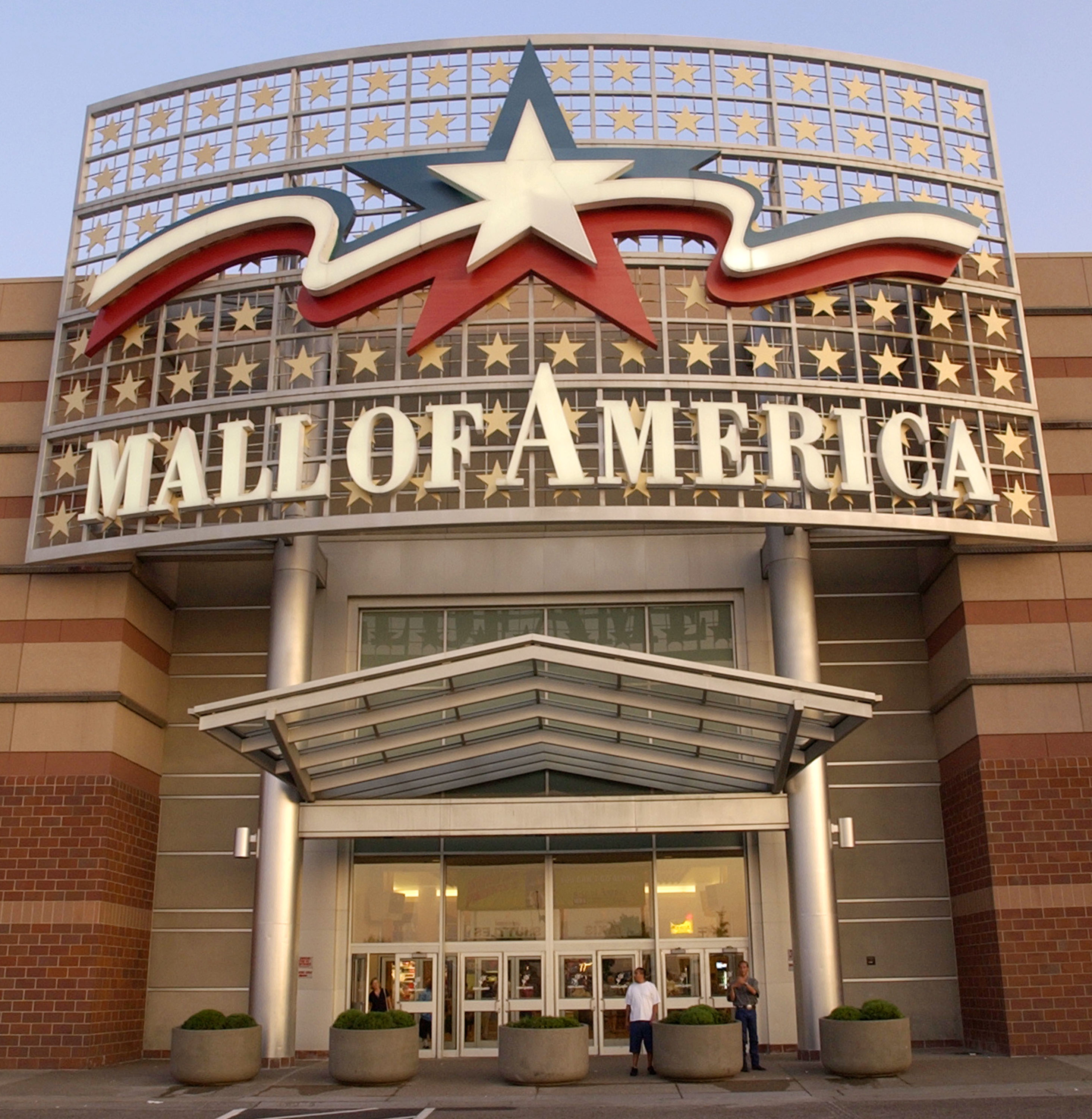 BLOOMINGTON, MN - JULY 16: (FEATURE STORY ON THE MALL OF AMERICA, 11 OF 15) A large sign hangs above an entrance to the Mall of America July 16, 2002 in Bloomington, Minnesota. The Mall of America is the largest shopping mall in the United States, seeing