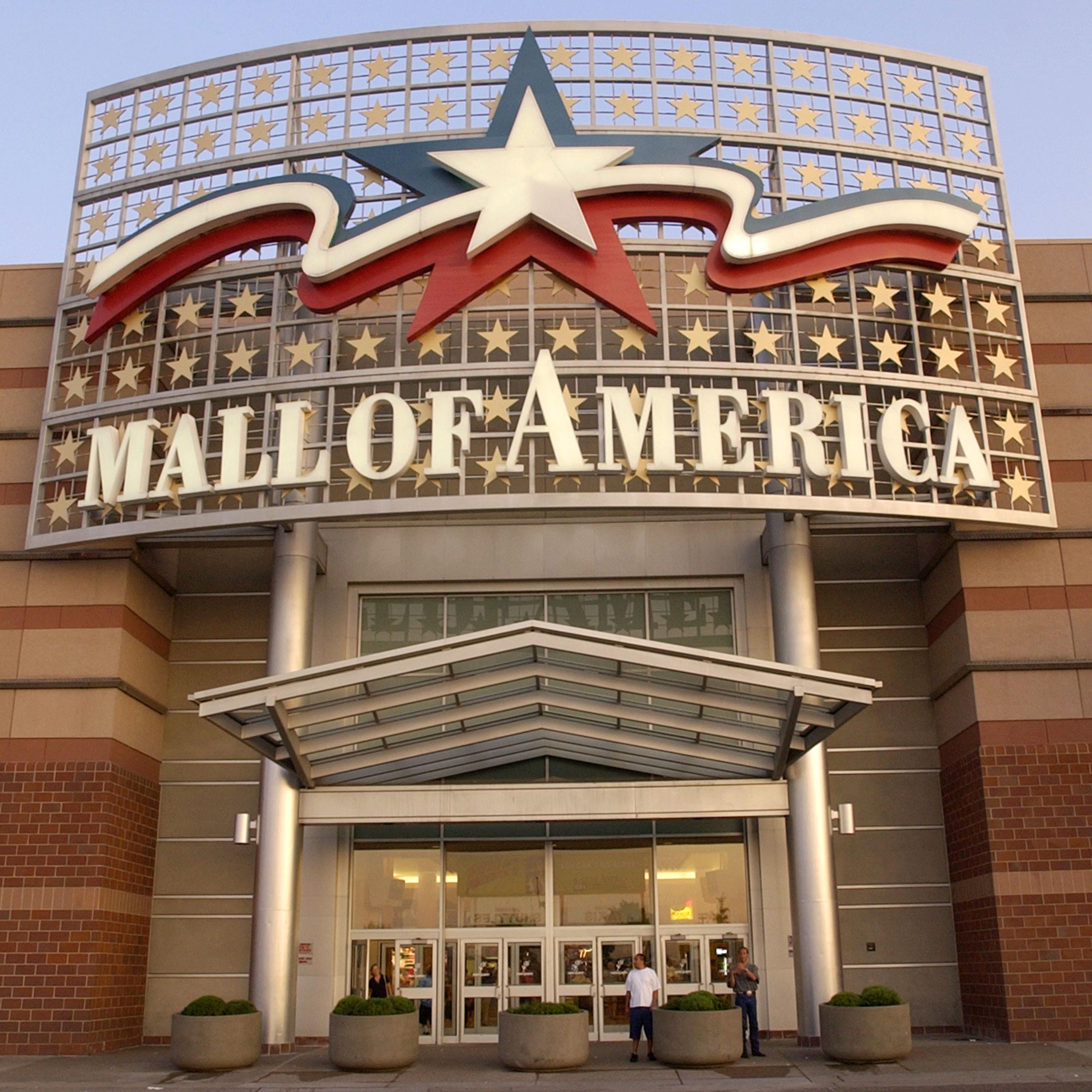 BLOOMINGTON, MN - JULY 16: (FEATURE STORY ON THE MALL OF AMERICA, 11 OF 15) A large sign hangs above an entrance to the Mall of America July 16, 2002 in Bloomington, Minnesota. The Mall of America is the largest shopping mall in the United States, seeing