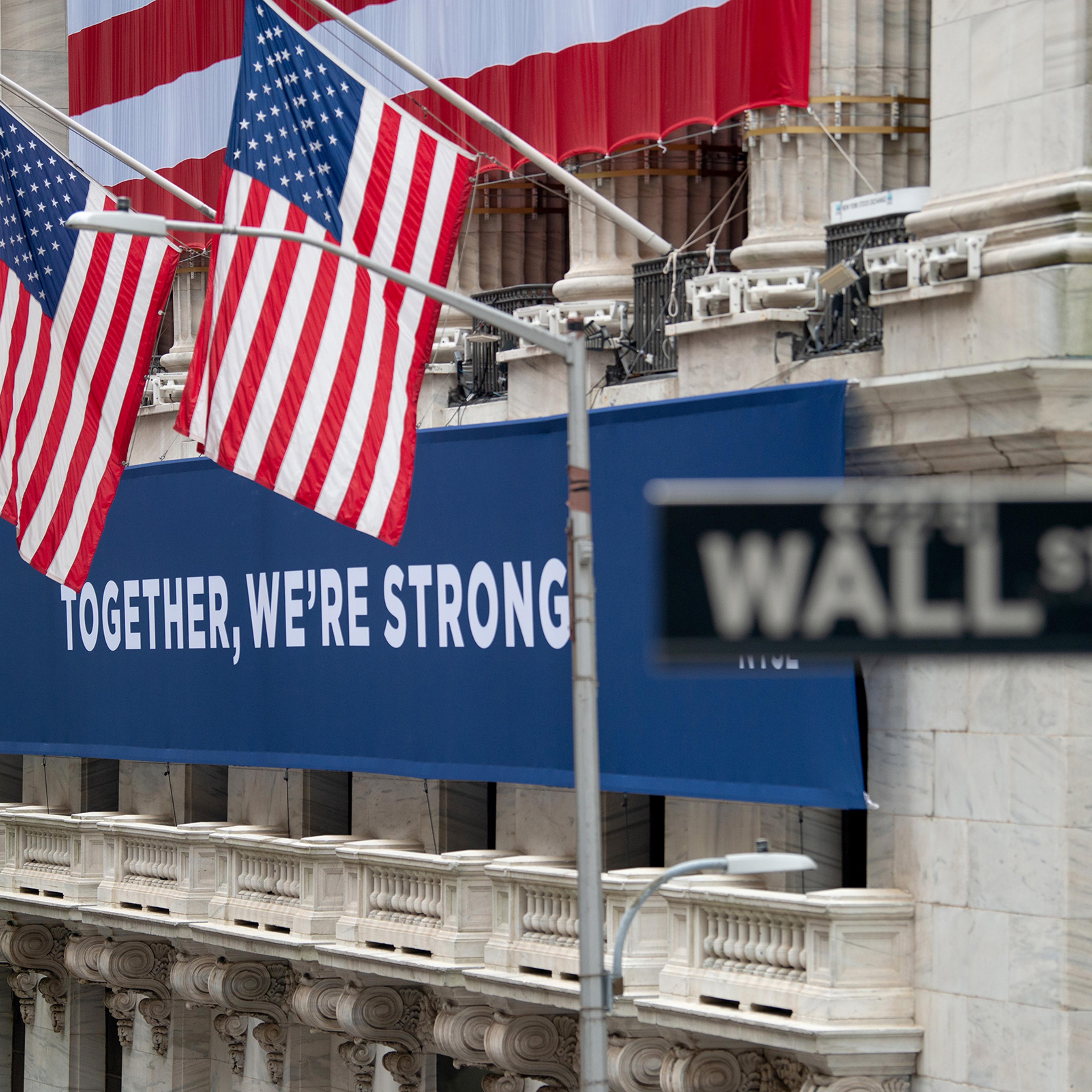 A view of the "Together, We're Strong" banner in front of the New York Stock Exchange on May 28