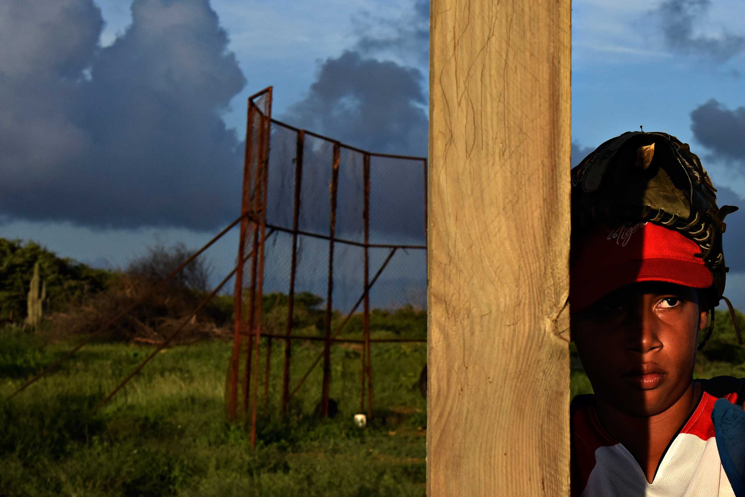 A boy on a baseball field in Tera Kora, Curacao.