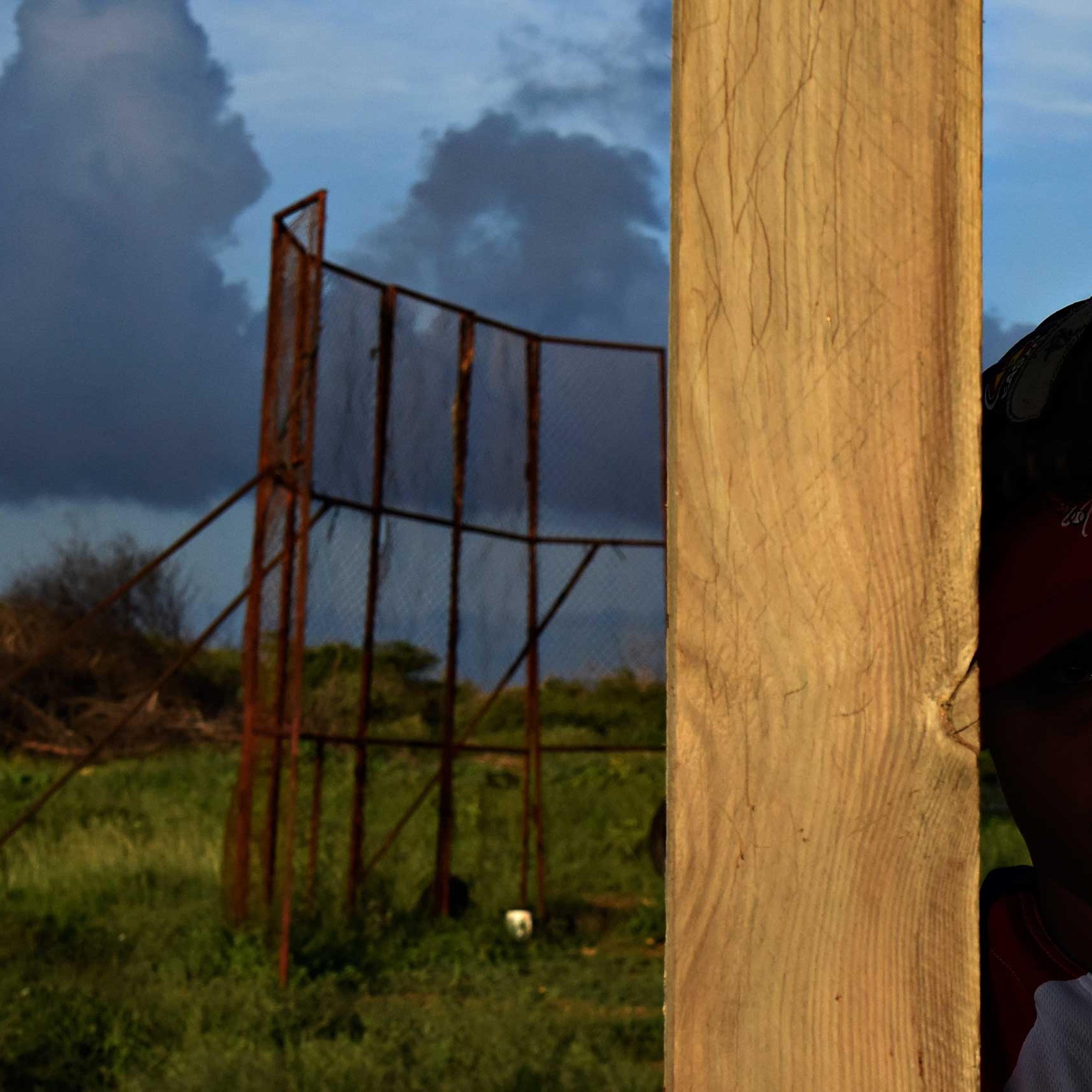 A boy on a baseball field in Tera Kora, Curacao.