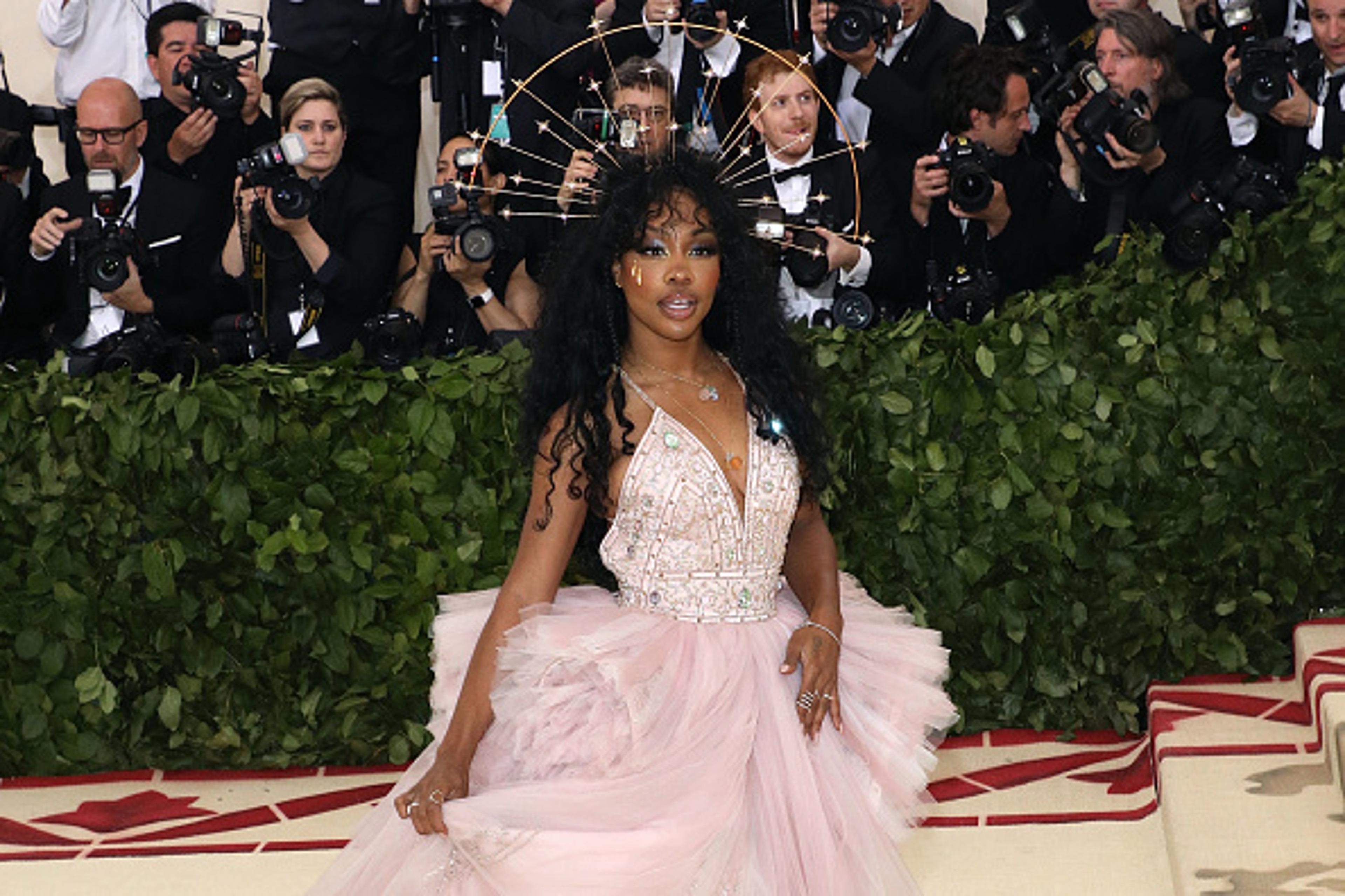 rihanna met gala 2018 dress designer Rihanna Just Won the Met Gala Again, This Time With A Bishop's Hat