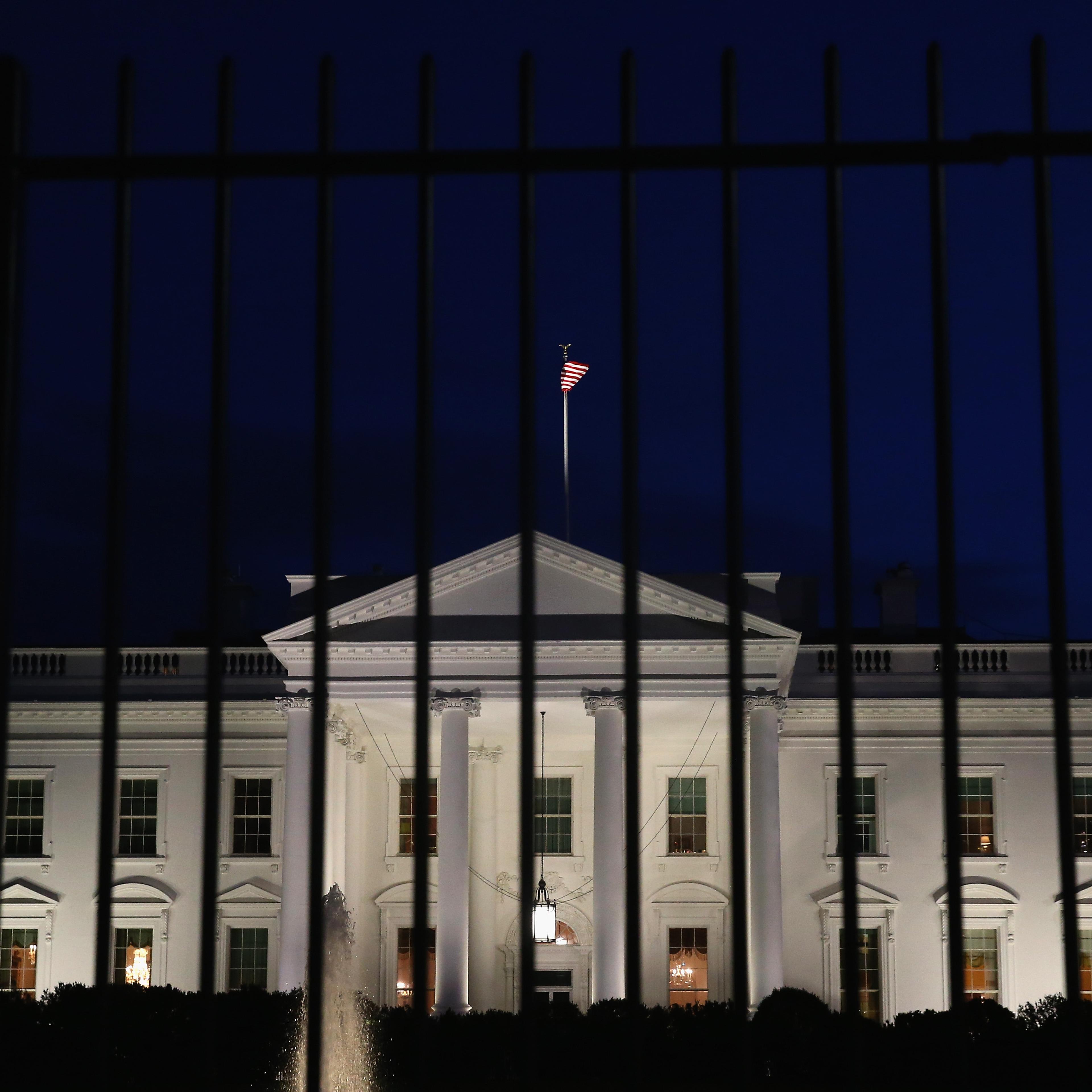 A tall security fence stands in front of the White House on Nov. 4, 2014 in Washington.