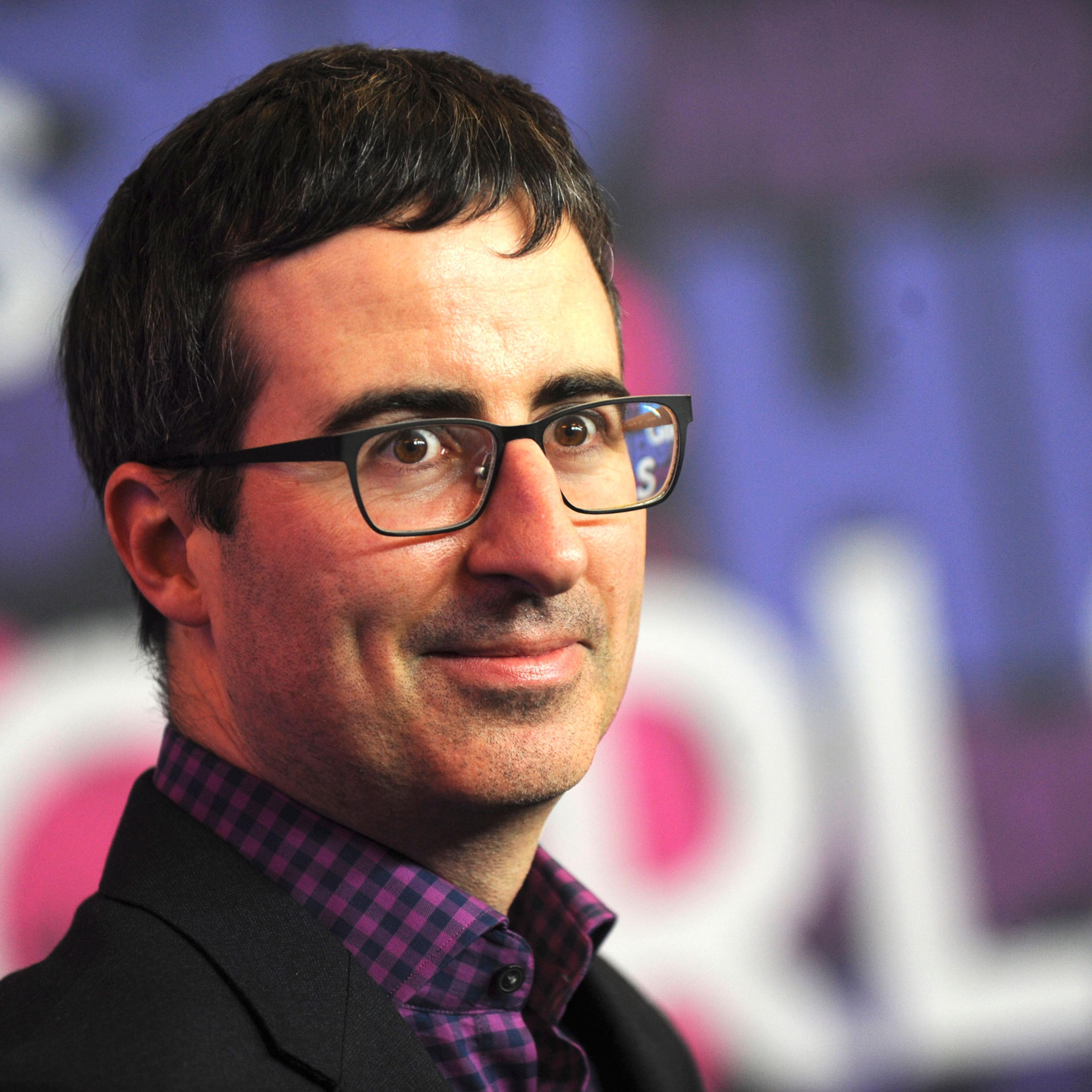 John Oliver attends the 'Girls' season four premiere at American Museum of Natural History on Jan. 5, 2015 in New York City.