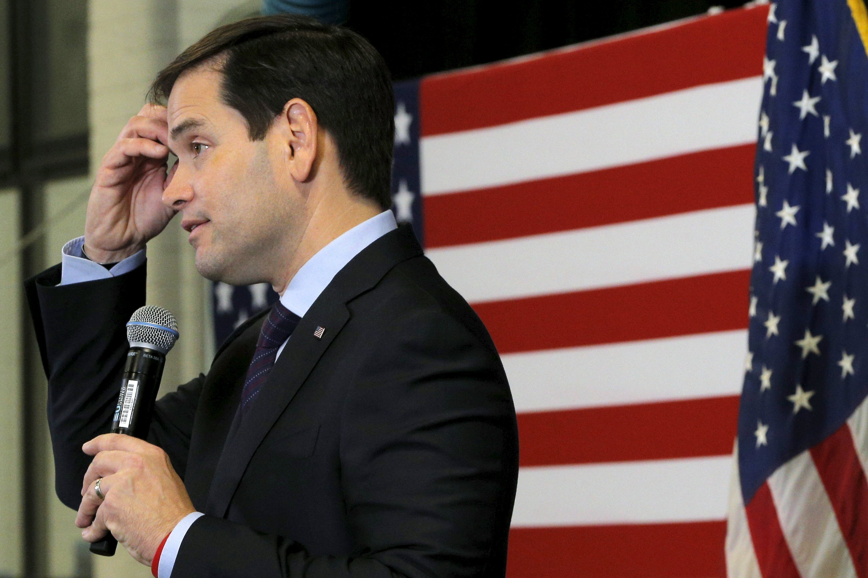 U.S. Republican presidential candidate and U.S. Senator Marco Rubio pauses while answering a question from the audience at a campaign town hall meeting at Nashua Community College in Nashua
