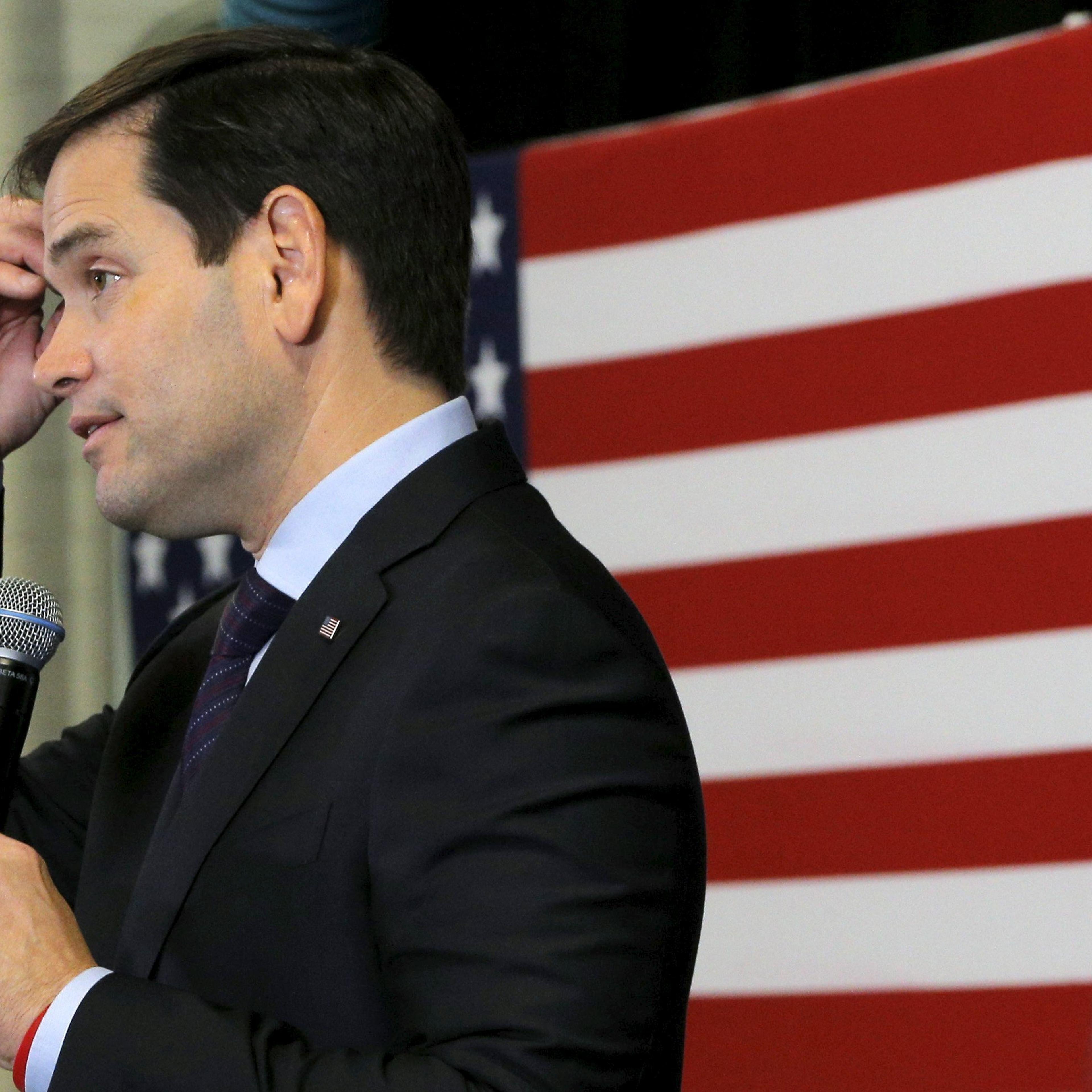 U.S. Republican presidential candidate and U.S. Senator Marco Rubio pauses while answering a question from the audience at a campaign town hall meeting at Nashua Community College in Nashua