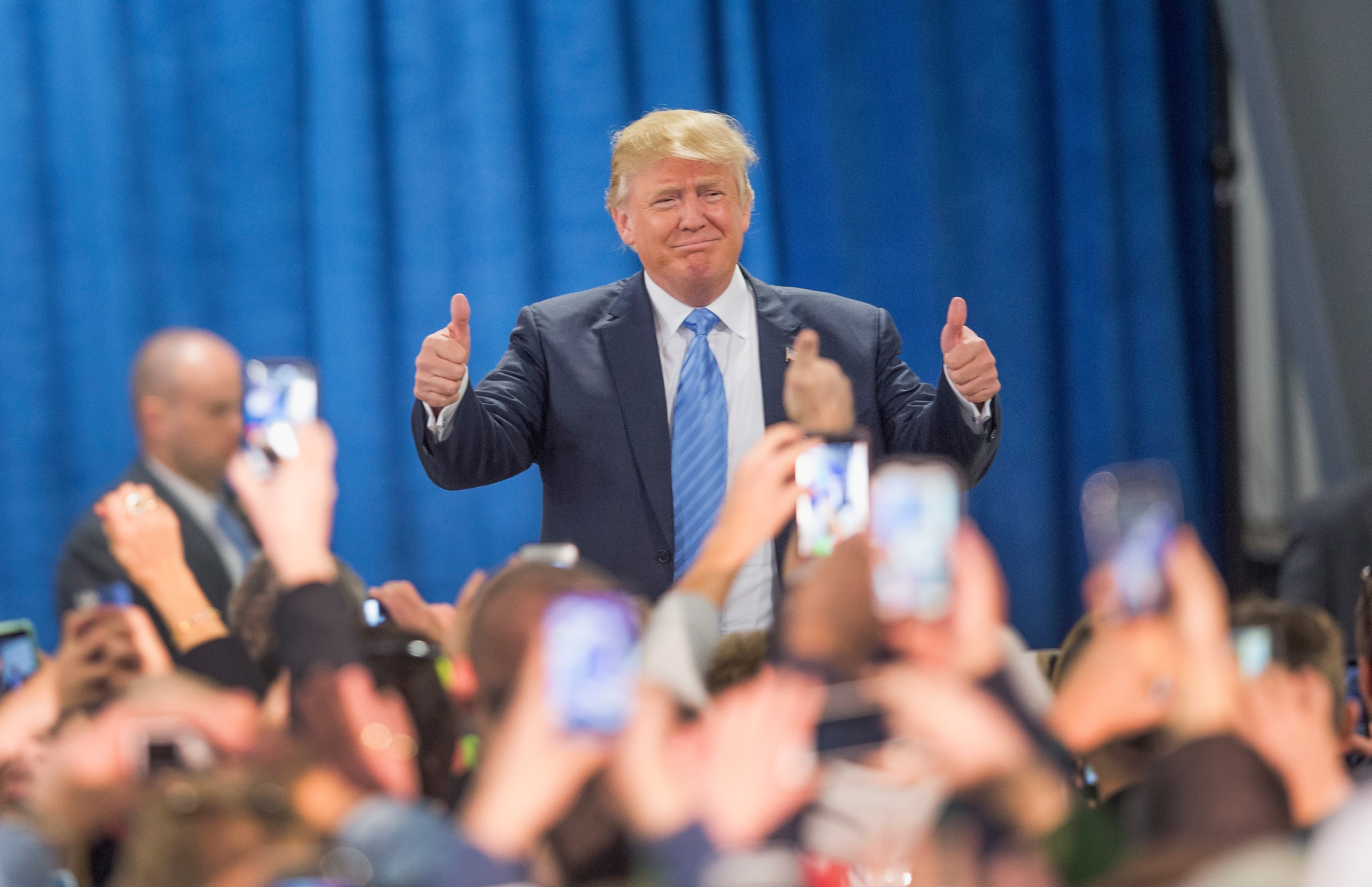 Republican presidential candidate Donald Trump arrives for a campaign event at Mississippi Valley Fairgrounds in Davenport, Iowa, on Dec. 5, 2015.