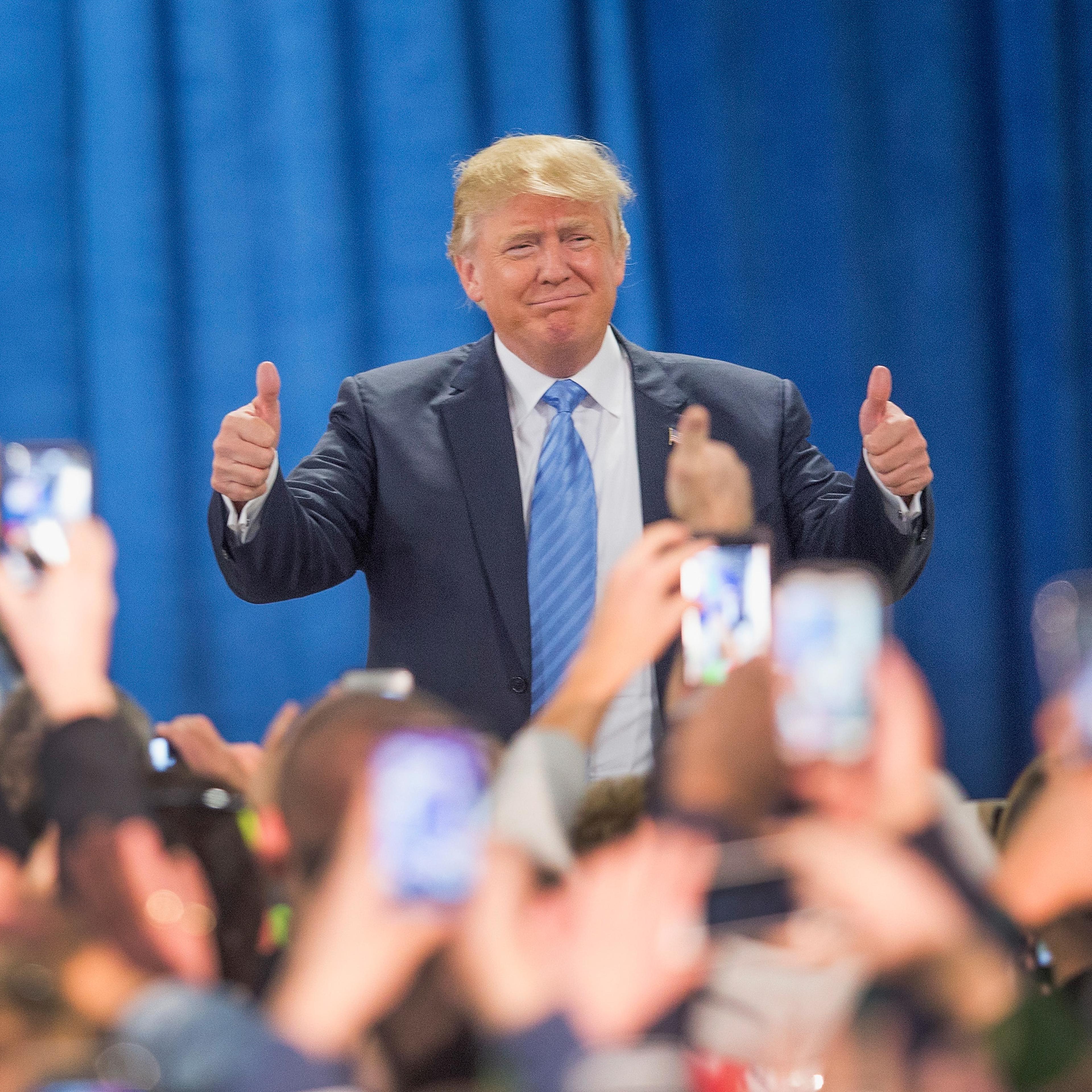 Republican presidential candidate Donald Trump arrives for a campaign event at Mississippi Valley Fairgrounds in Davenport, Iowa, on Dec. 5, 2015.