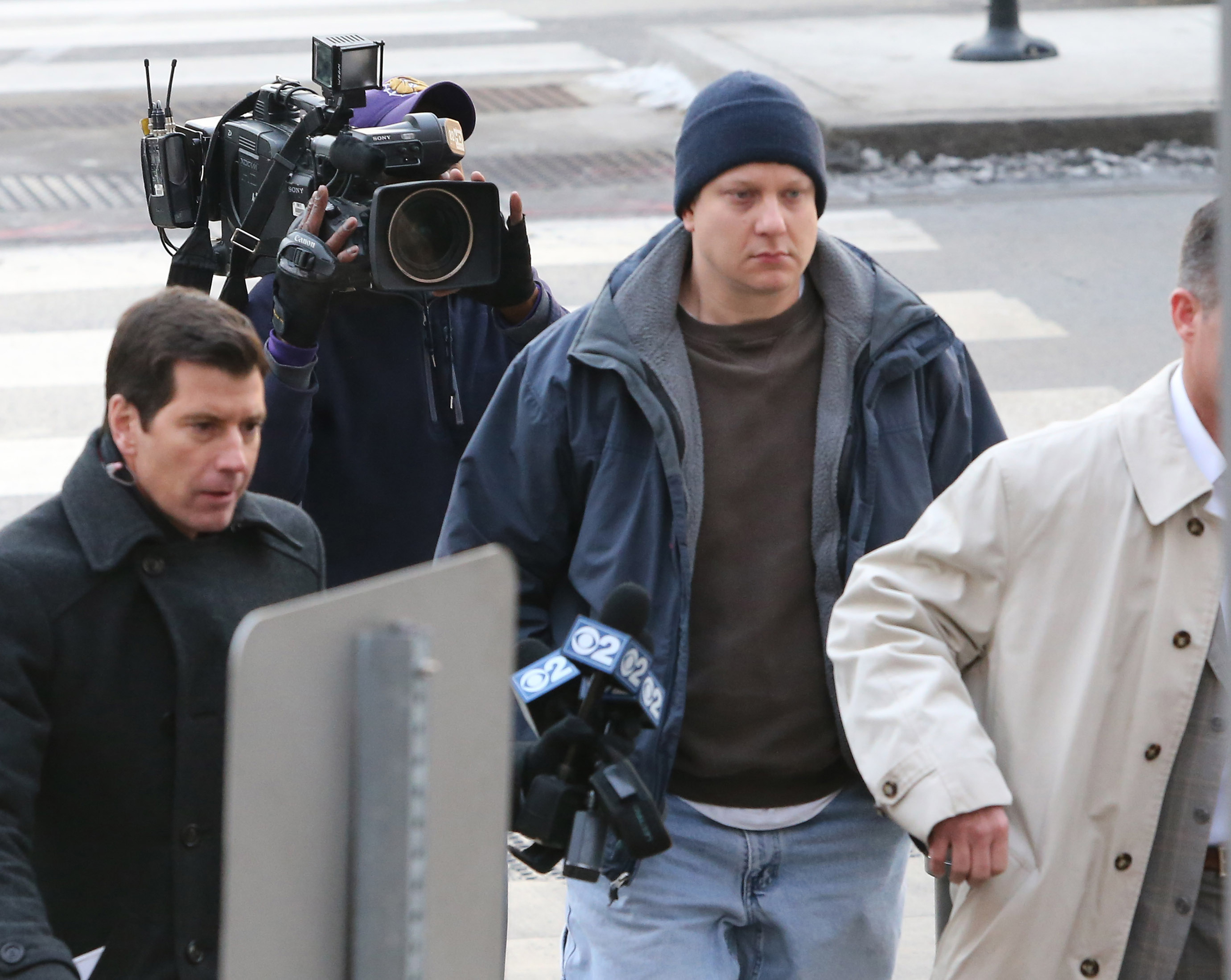 Chicago police officer Jason Van Dyke arrives at court