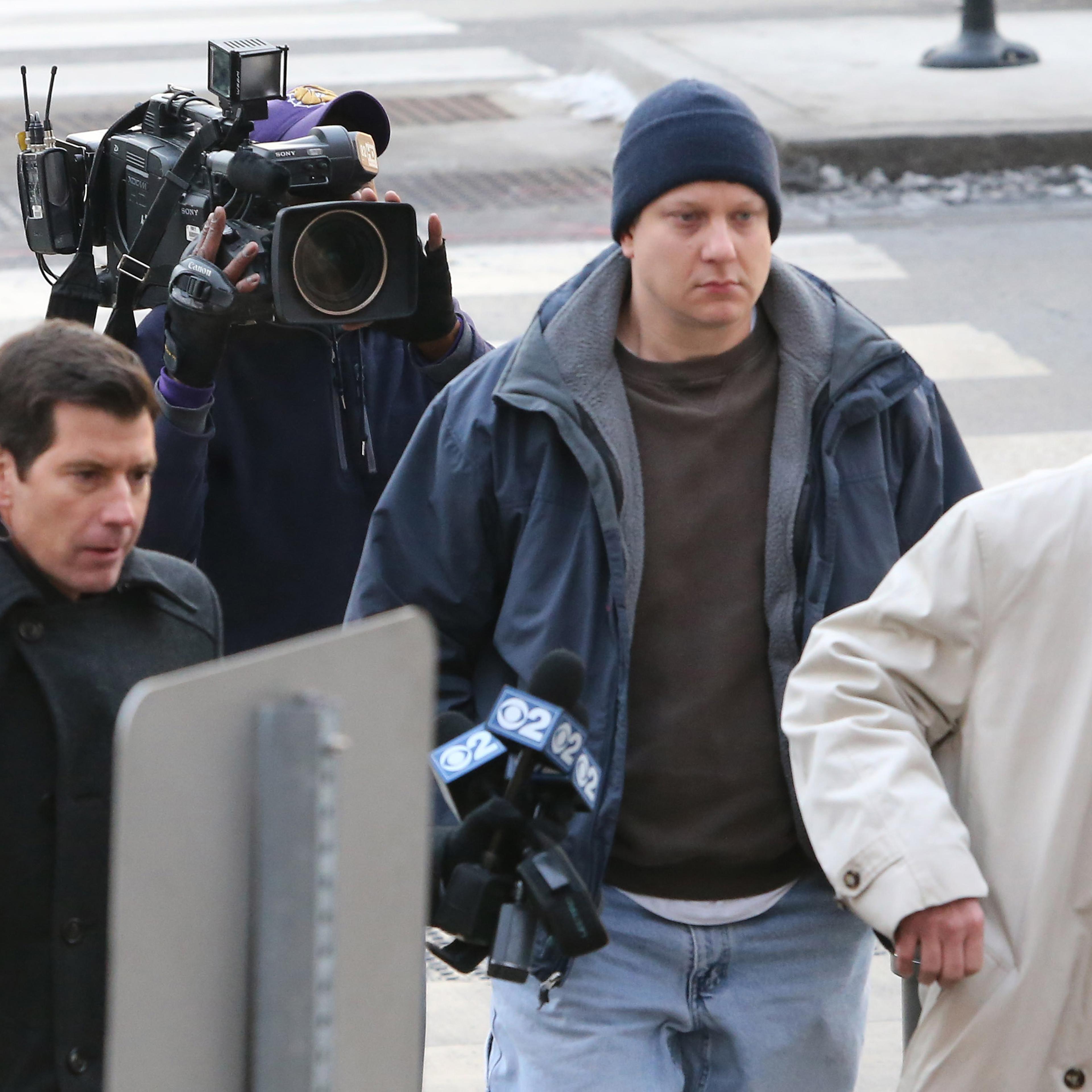 Chicago police officer Jason Van Dyke arrives at court