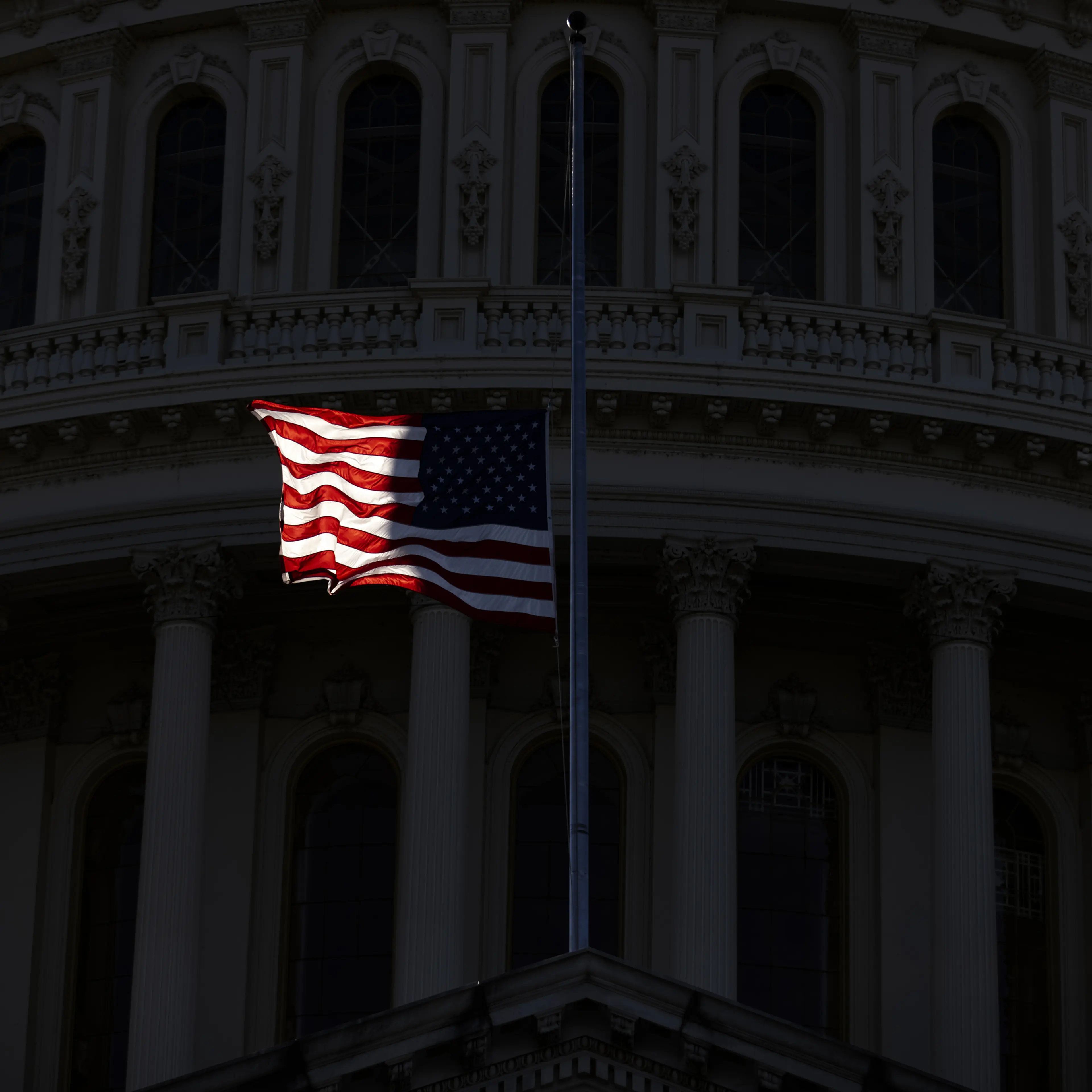 An American Flag Flying At Half Staff