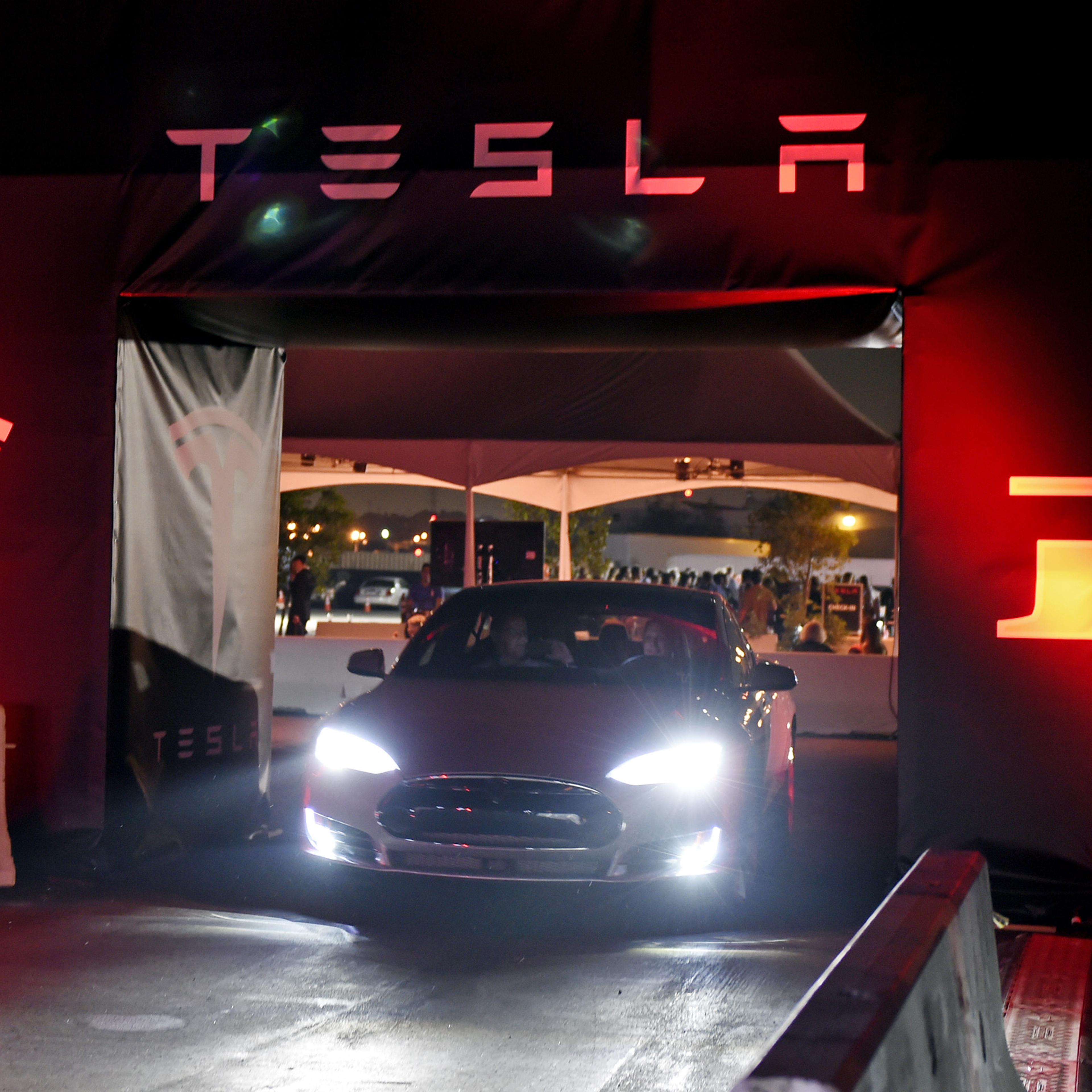 Telsa CEO Elon Musk Unveils New Vehicle