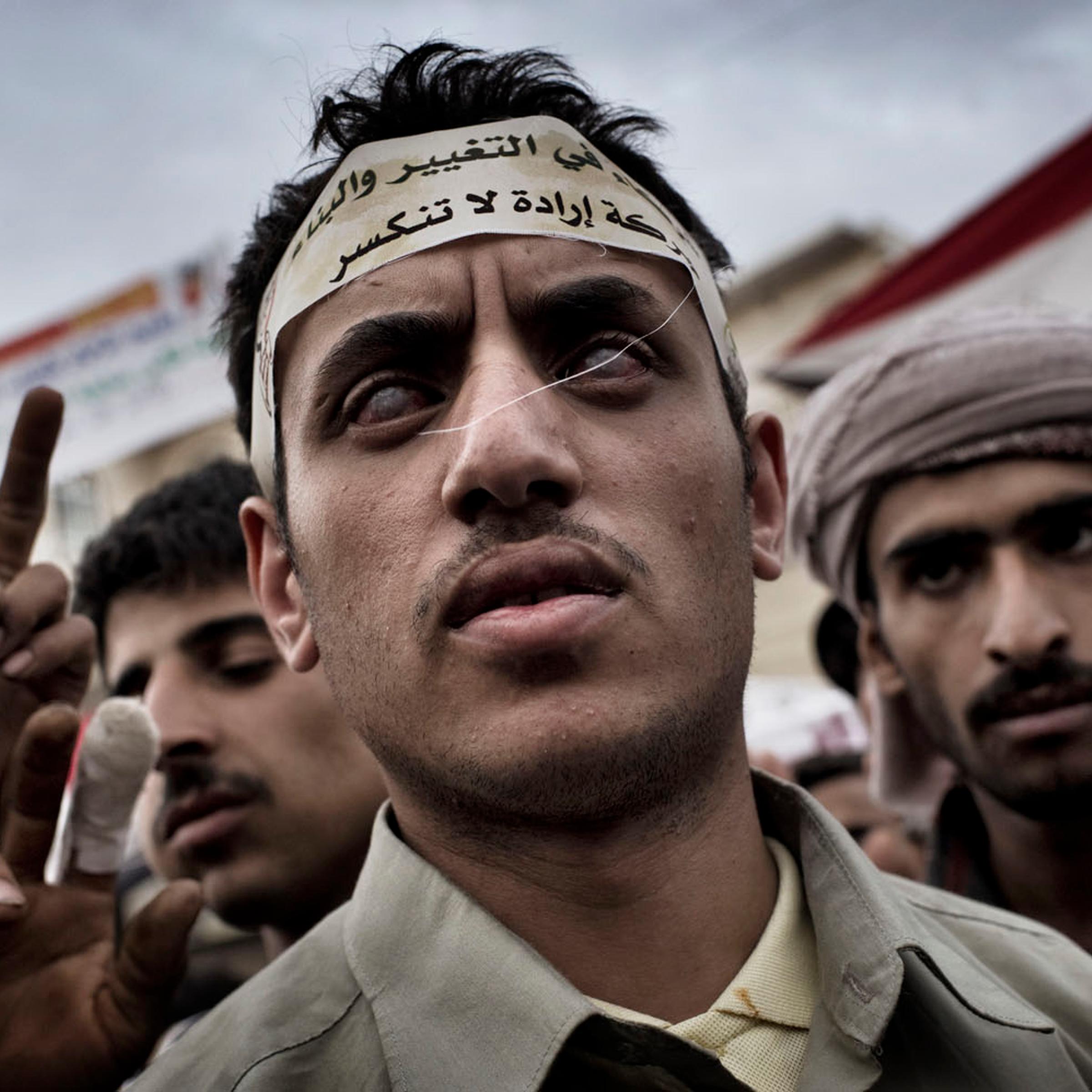 A blind protester attends a demonstration at Change Square in Sana'a, May 16, 2011.