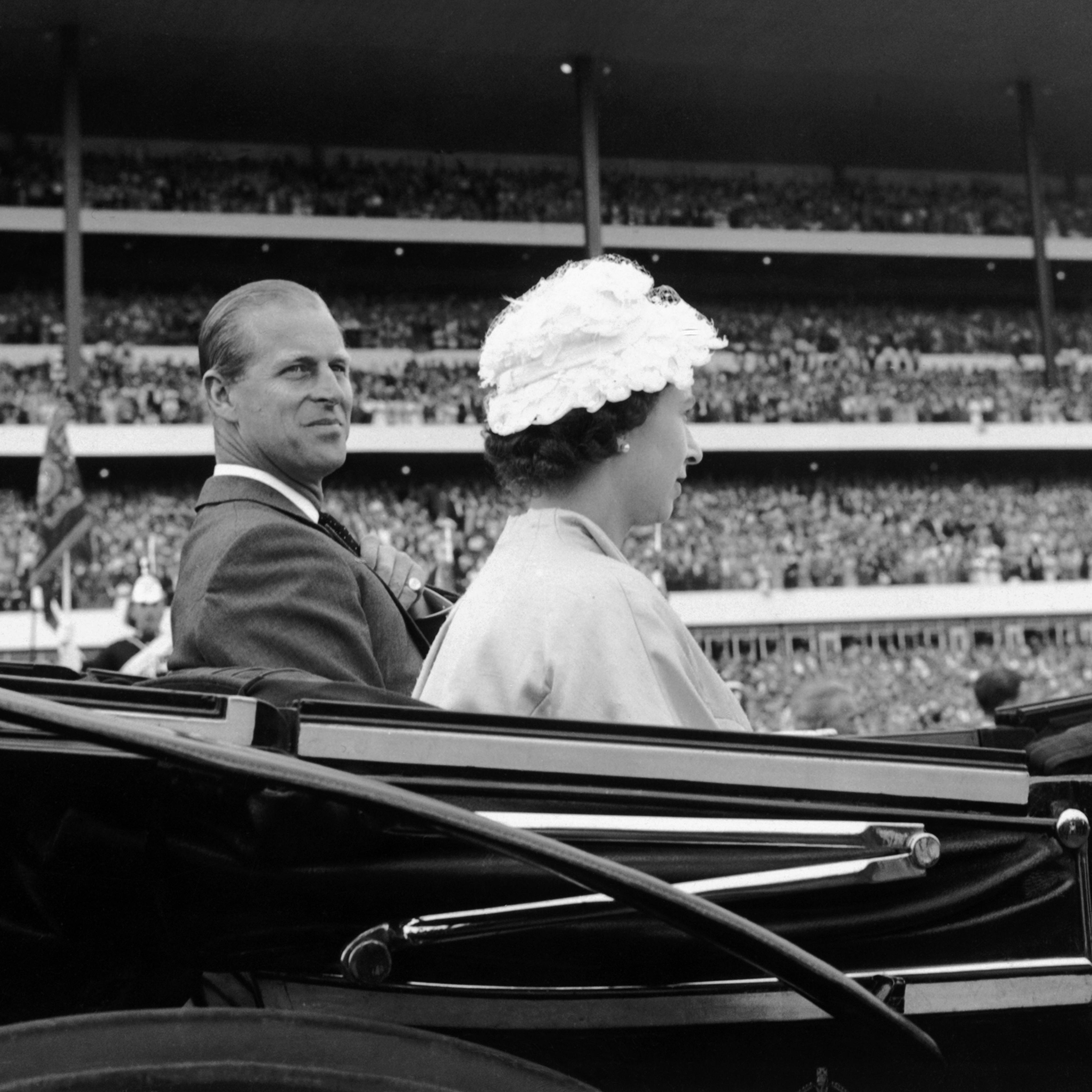 Her Majesty Queen Elizabeth II and her husband Prince Philip, Duke of Edinburgh, arrive in a carriage to attend the opening ceremonies of the 100th running of the Queen's Plate