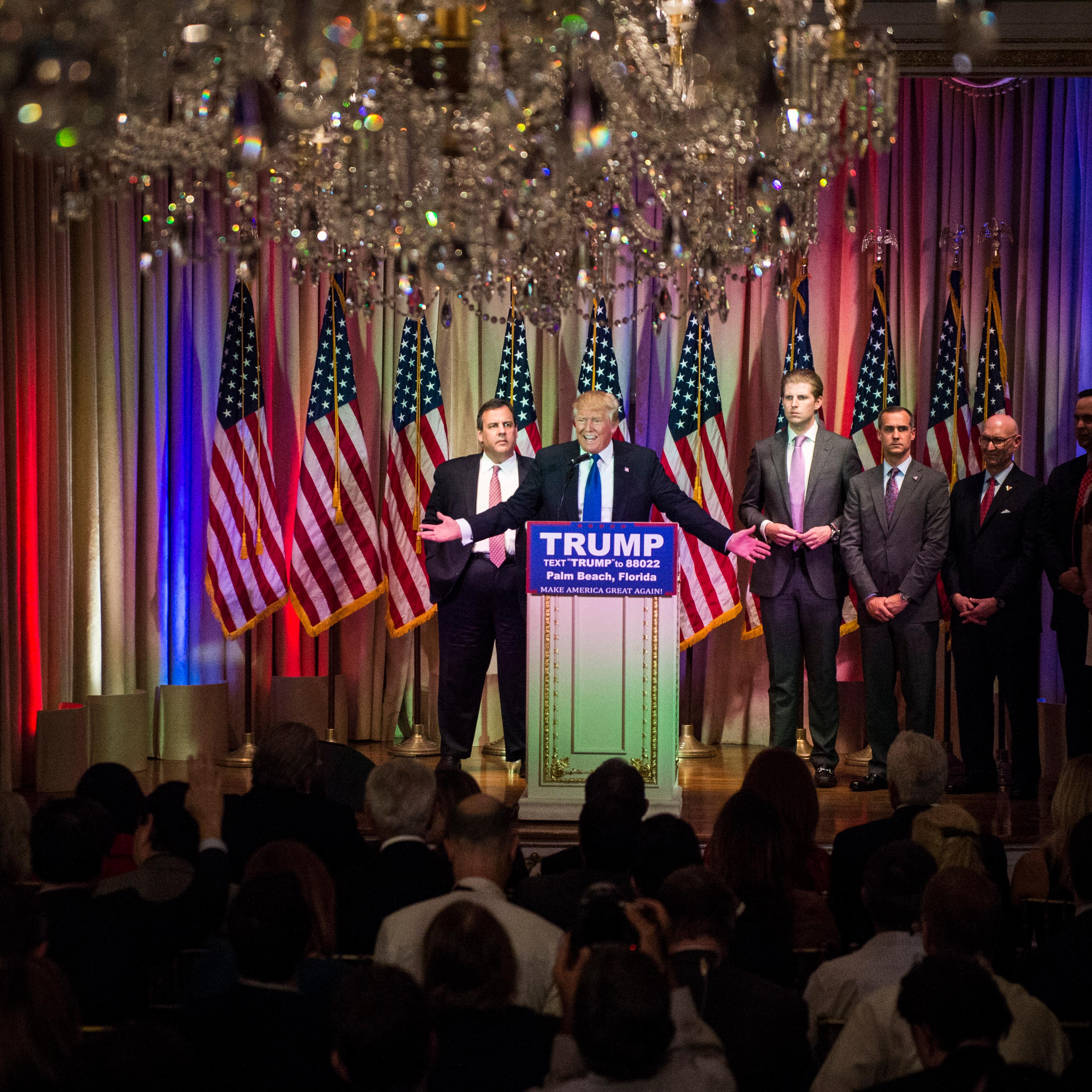 Republican presidential candidate Donald Trump speaks, alongside New Jersey Gov. Chris Christie, left, during a campaign press event at the Mar-A-Lago Club in Palm Beach, FL on Mar. 1, 2016.