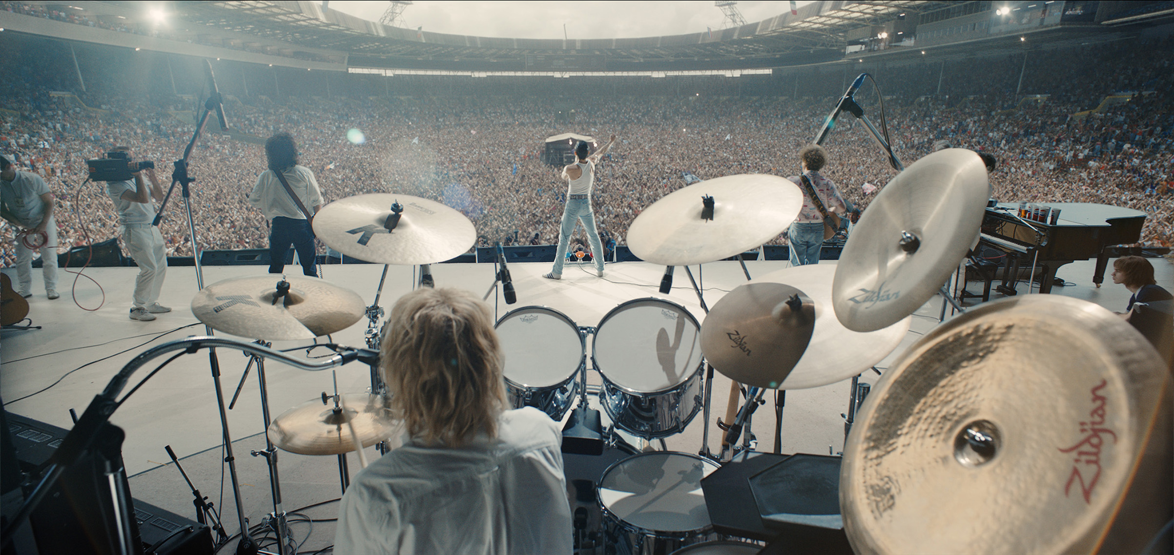 L-R: Gwilym Lee (Brian May), Ben Hardy (Roger Taylor), Rami Malek (Freddie Mercury), and Joe Mazzello (John Deacon) star in Bohemian Rhapsody