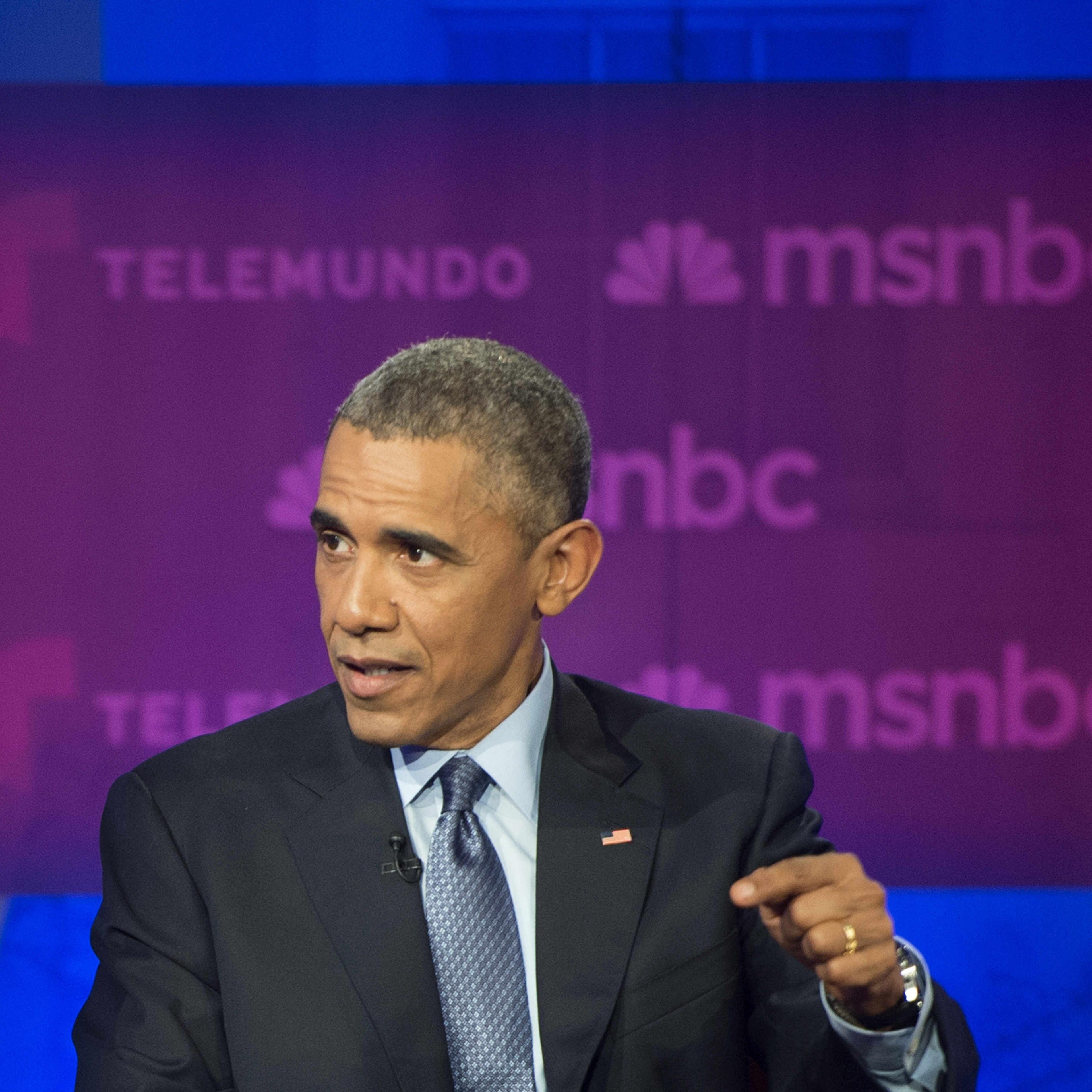 President Barack Obama answers a question from the audience during an immigration town hall meeting and Telemundo interview at Florida International University in Miami on Feb. 25, 2015.