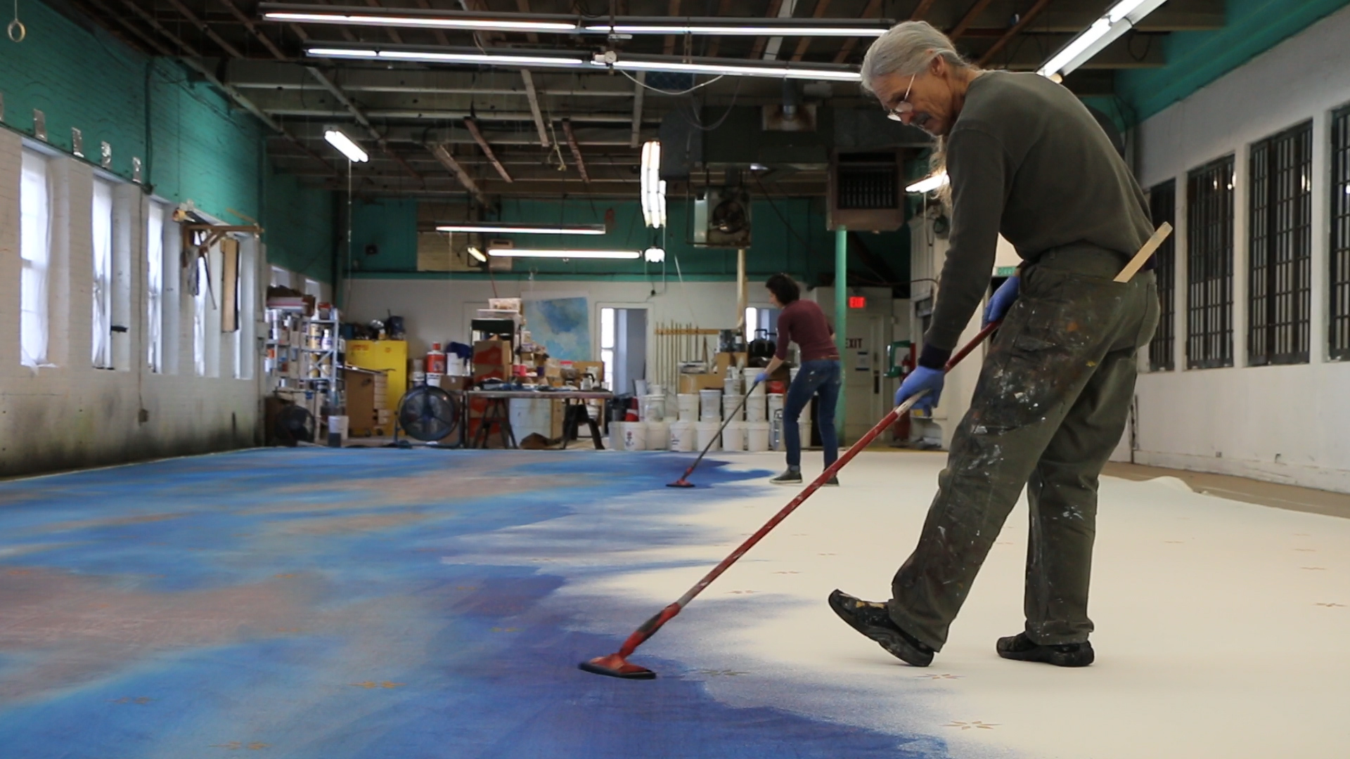 Painters work on set piece for Carousel revival