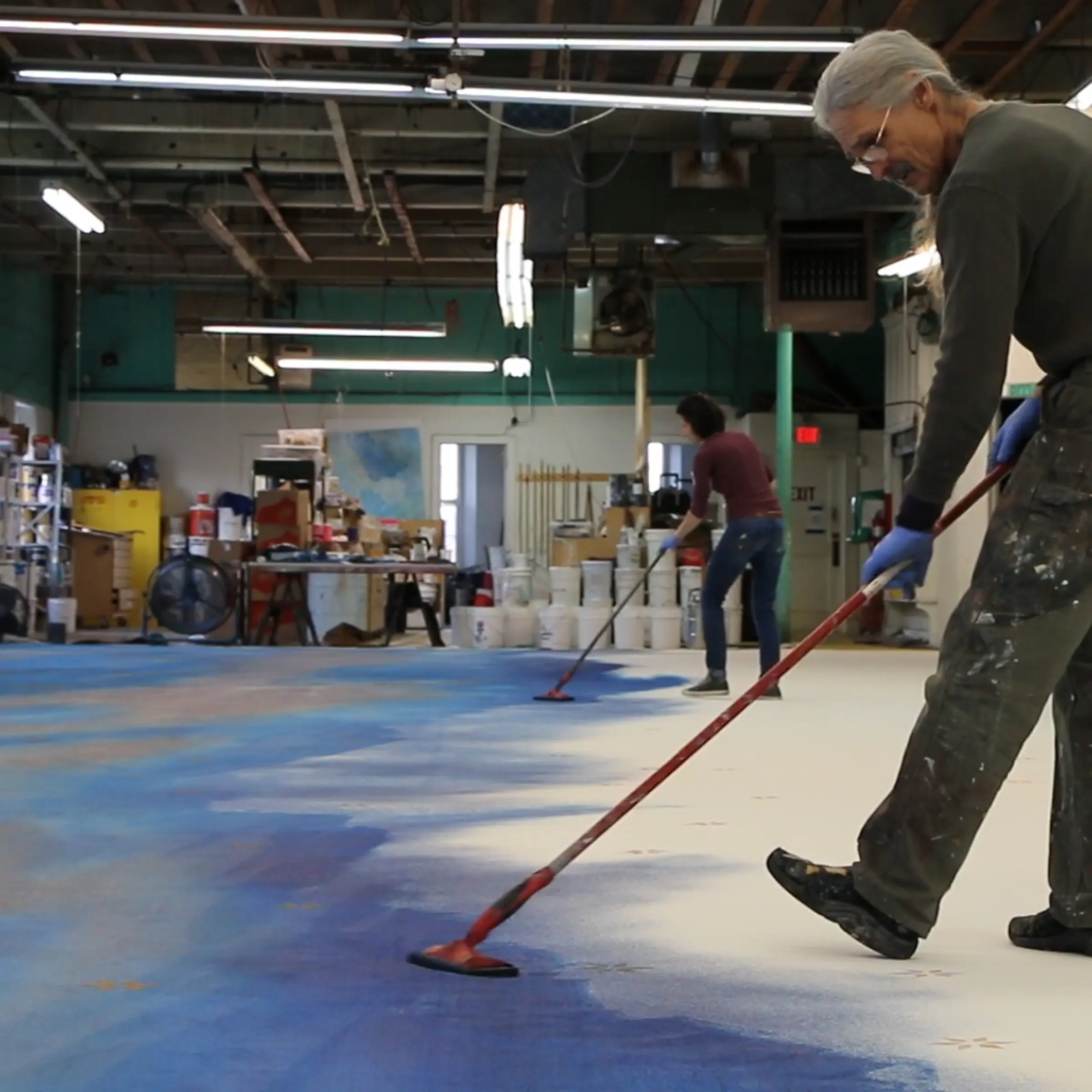 Painters work on set piece for Carousel revival