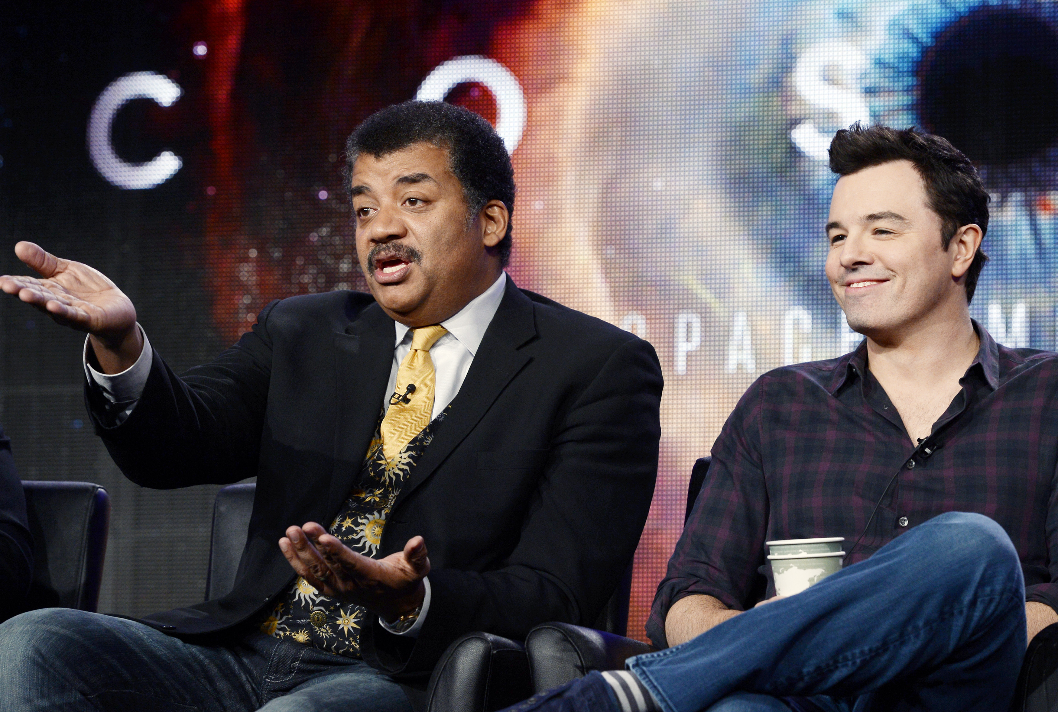 Host Neil DeGrasse Tyson and Seth MacFarlane, executive producer of "Cosmos", participate in Fox Broadcasting Company's part of the Television Critics Association (TCA) Winter 2014 presentations in Pasadena