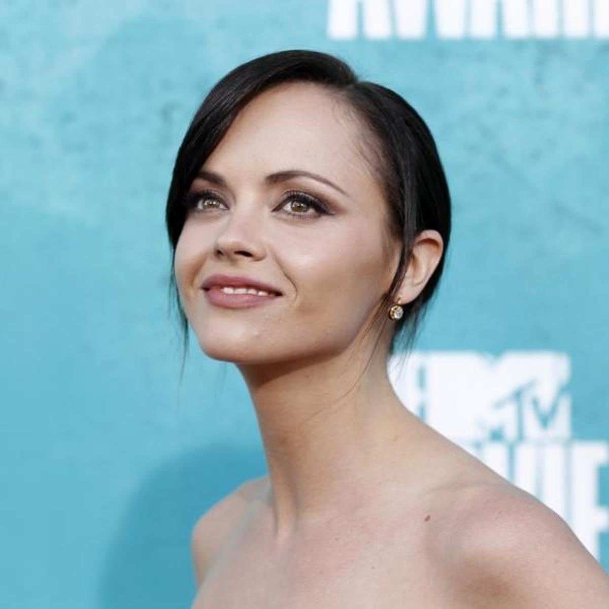 Actress Christina Ricci arrives at the 2012 MTV Movie Awards in Los Angeles