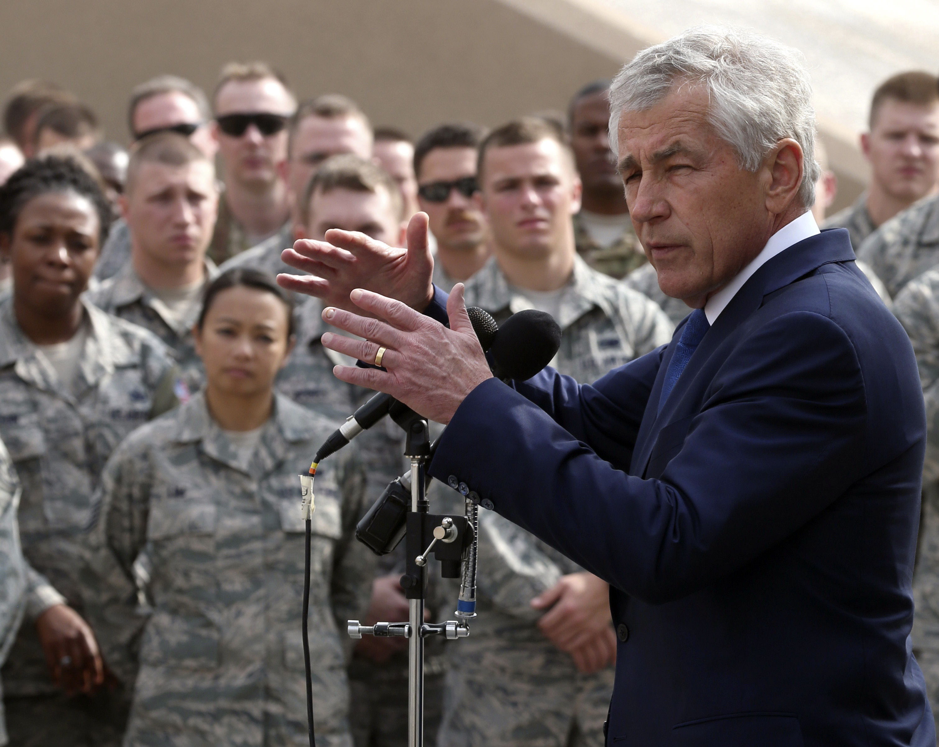 U.S. Secretary of Defense Chuck Hagel speaks to U.S. troops at the Al Udeid Airbase, west of Doha