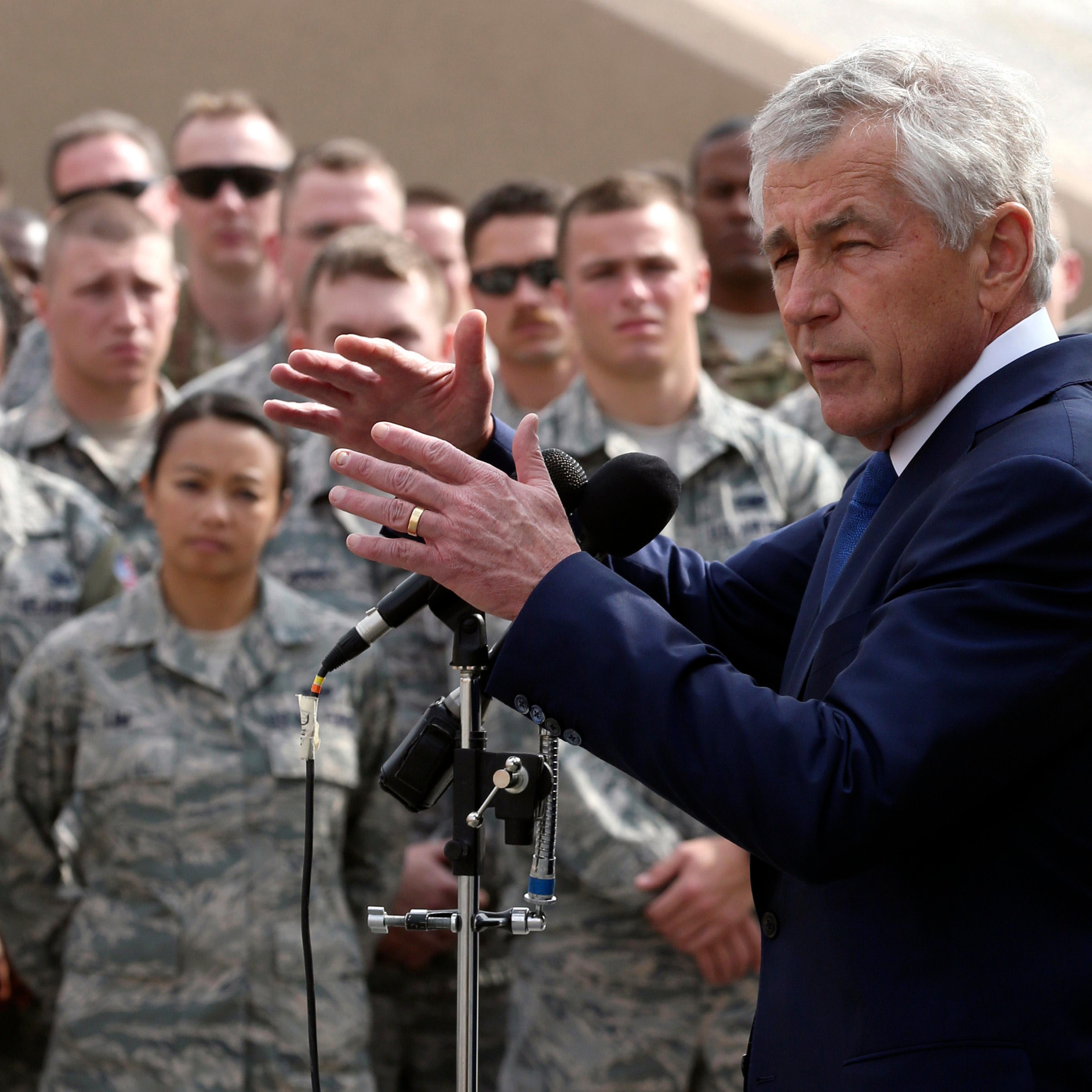 U.S. Secretary of Defense Chuck Hagel speaks to U.S. troops at the Al Udeid Airbase, west of Doha