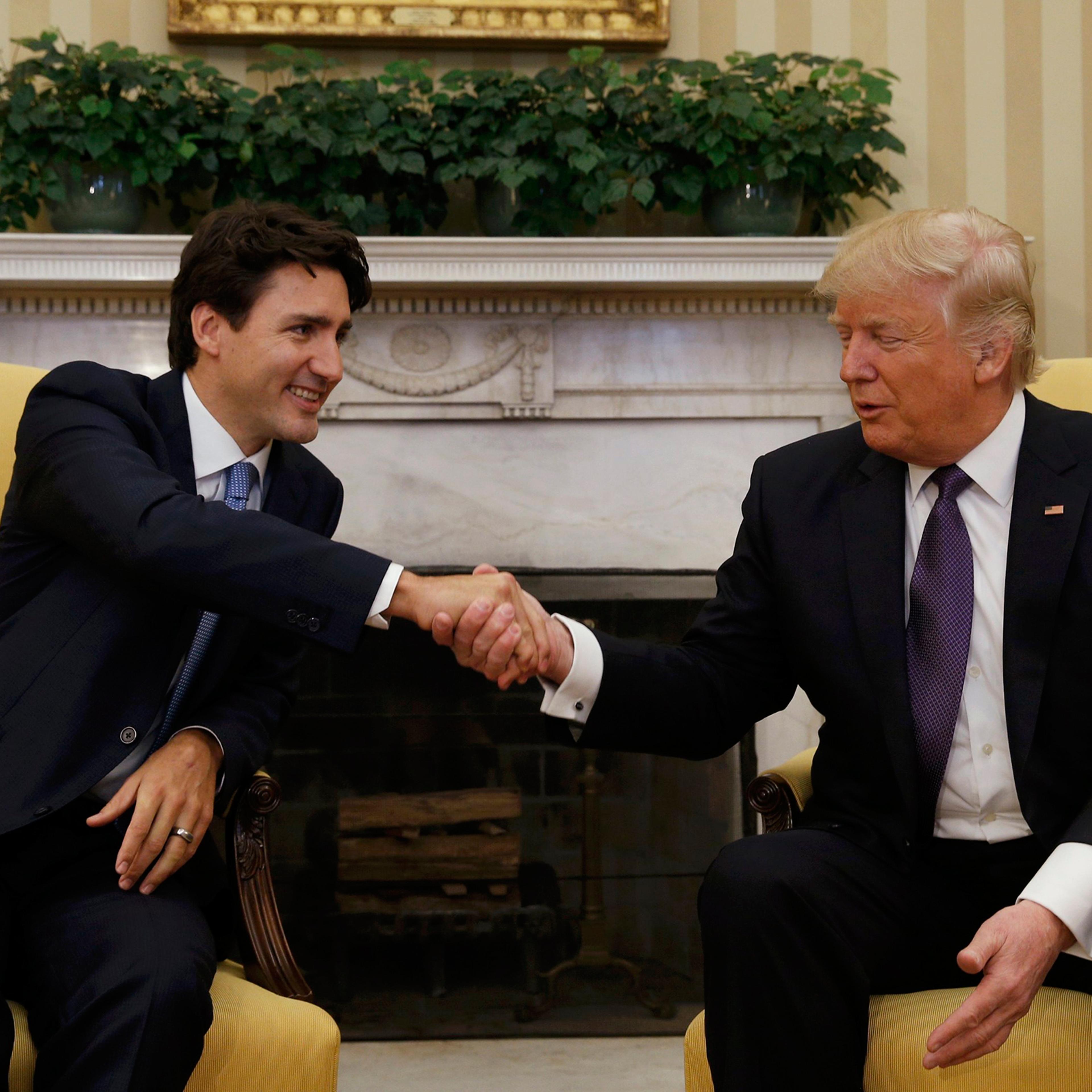 Canadian Prime Minister Justin Trudeau shakes hands with President Donald Trump in the Oval Office at the White House on Feb. 13, 2017.