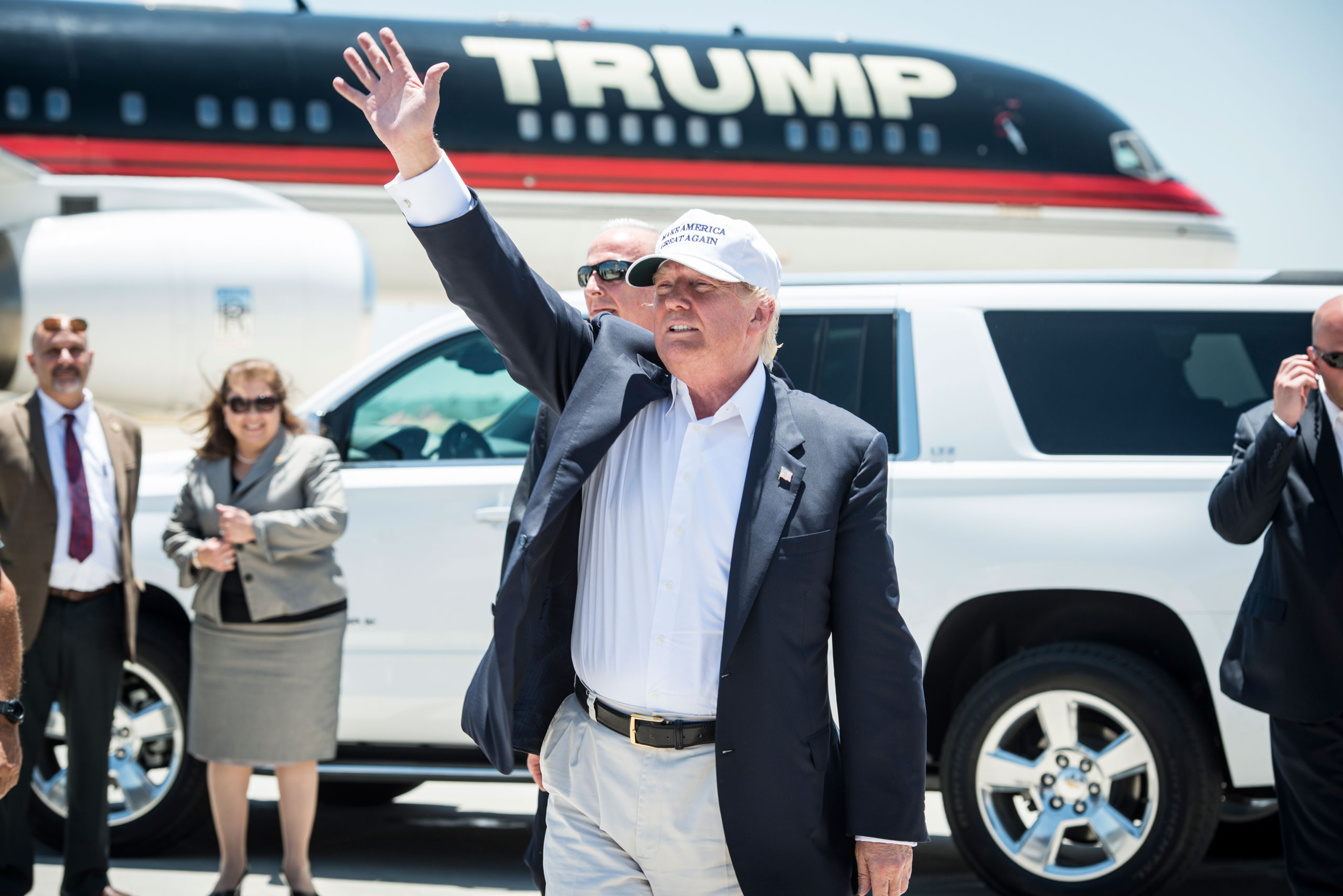 Republican Presidential candidate and business mogul Donald Trump exits his plane during his trip to the border on July 23, 2015 in Laredo, Texas. Trump's recent comments, calling some immigrants from Mexico as drug traffickers and rapists, have stirred 
