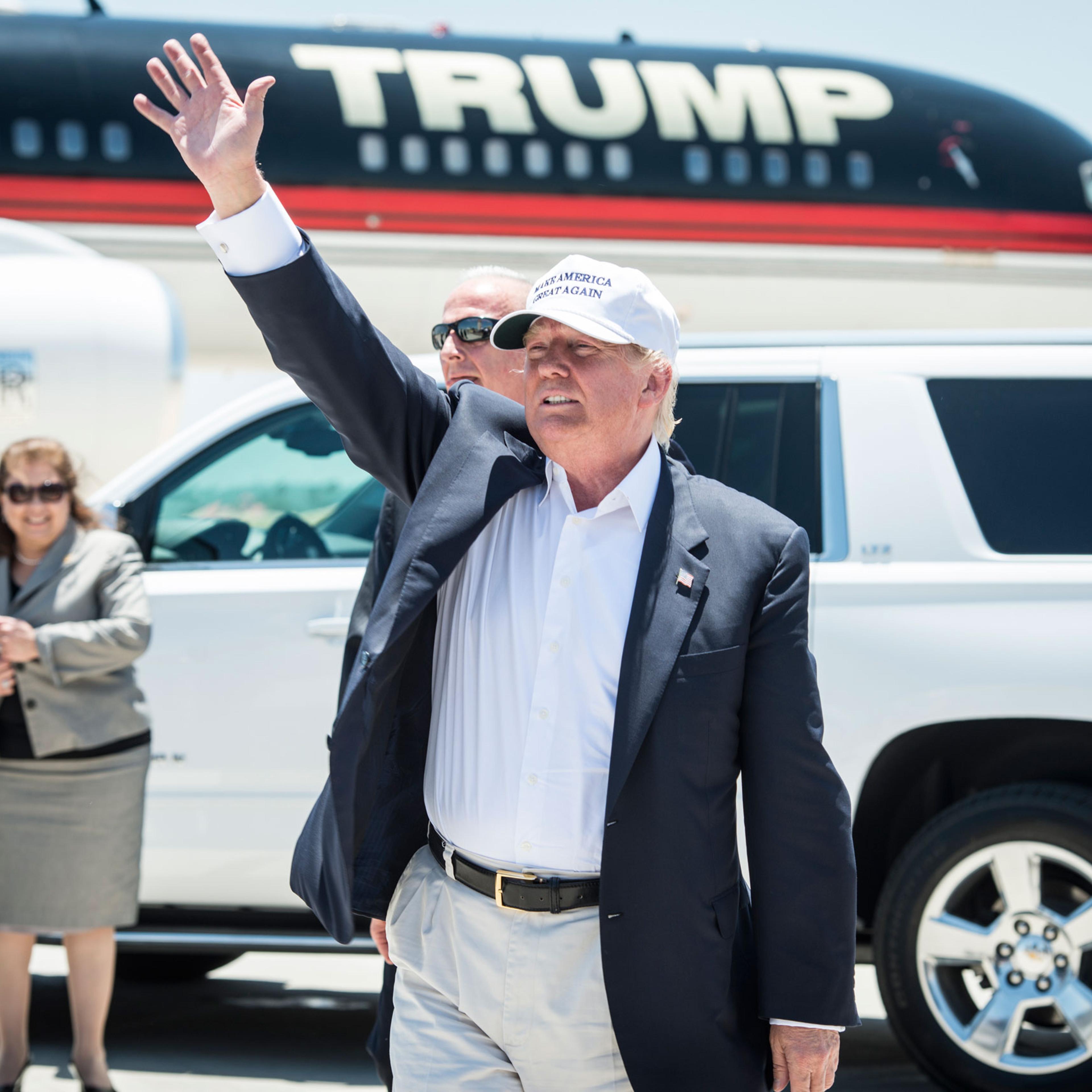 Republican Presidential candidate and business mogul Donald Trump exits his plane during his trip to the border on July 23, 2015 in Laredo, Texas. Trump's recent comments, calling some immigrants from Mexico as drug traffickers and rapists, have stirred