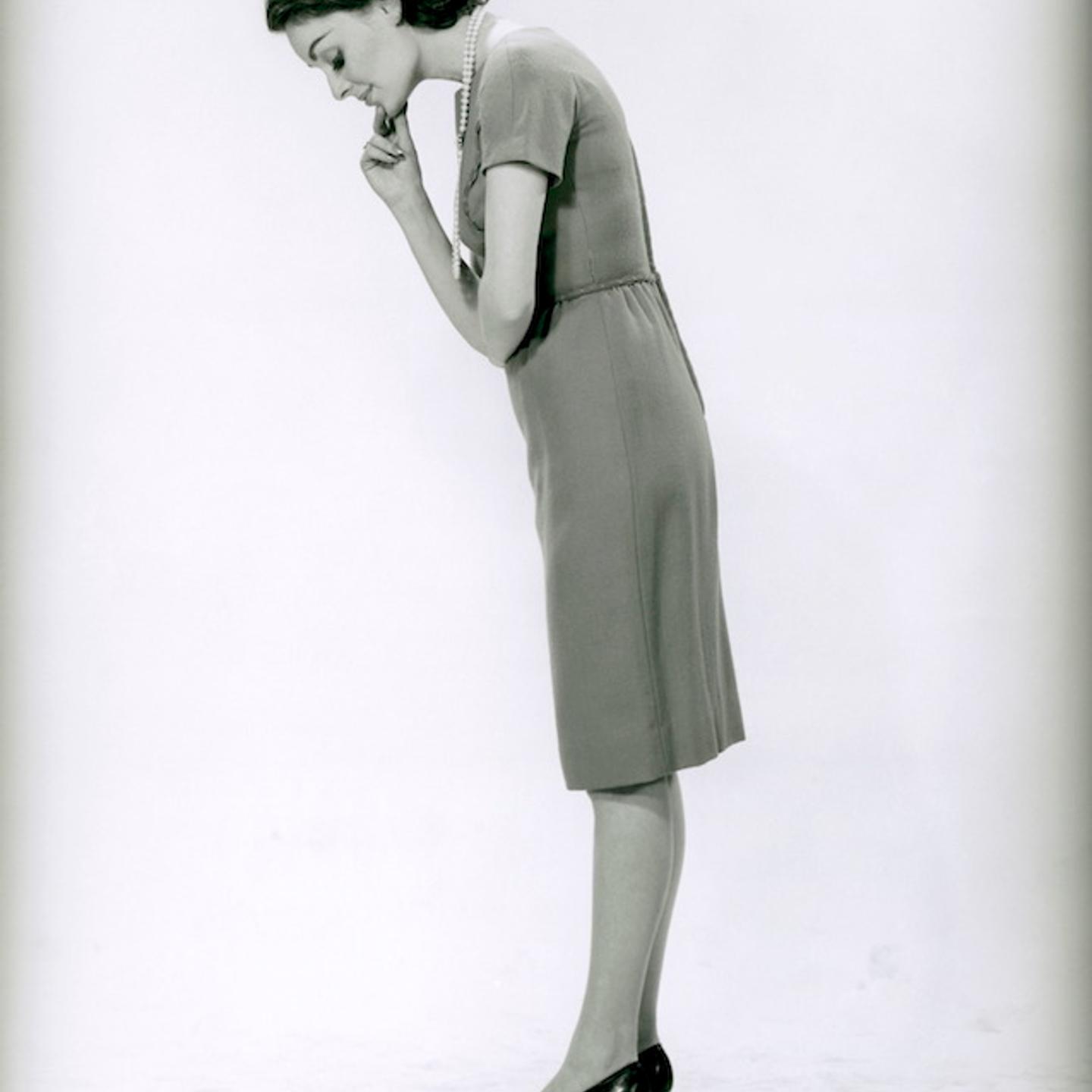Woman standing on scale