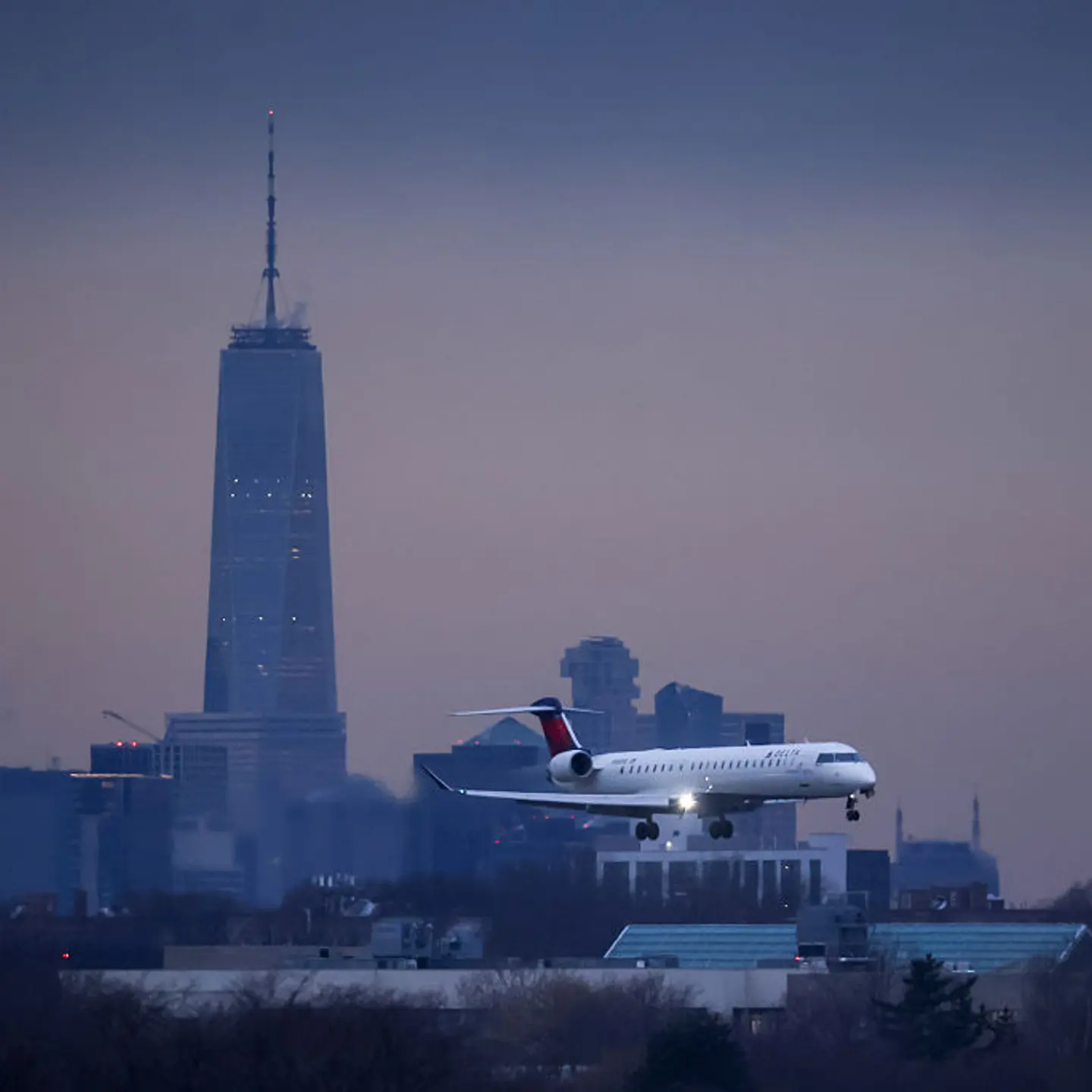 Snow Storm Disrupts Holiday Travel At New York City Airports