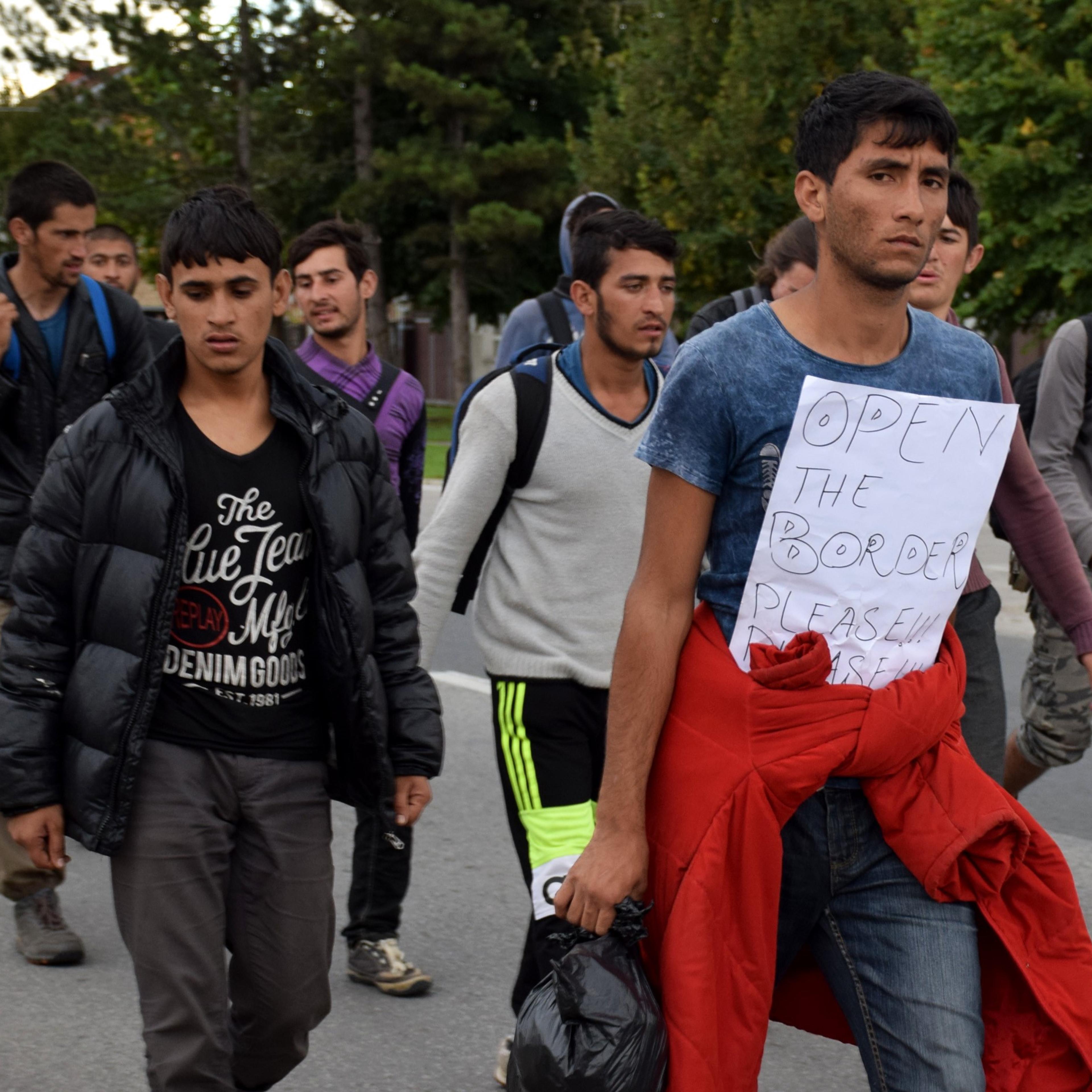 Refugees make their way to Hungarian border with Serbia near the town of Horgos in Belgrade, Serbia on Oct. 4, 2016.