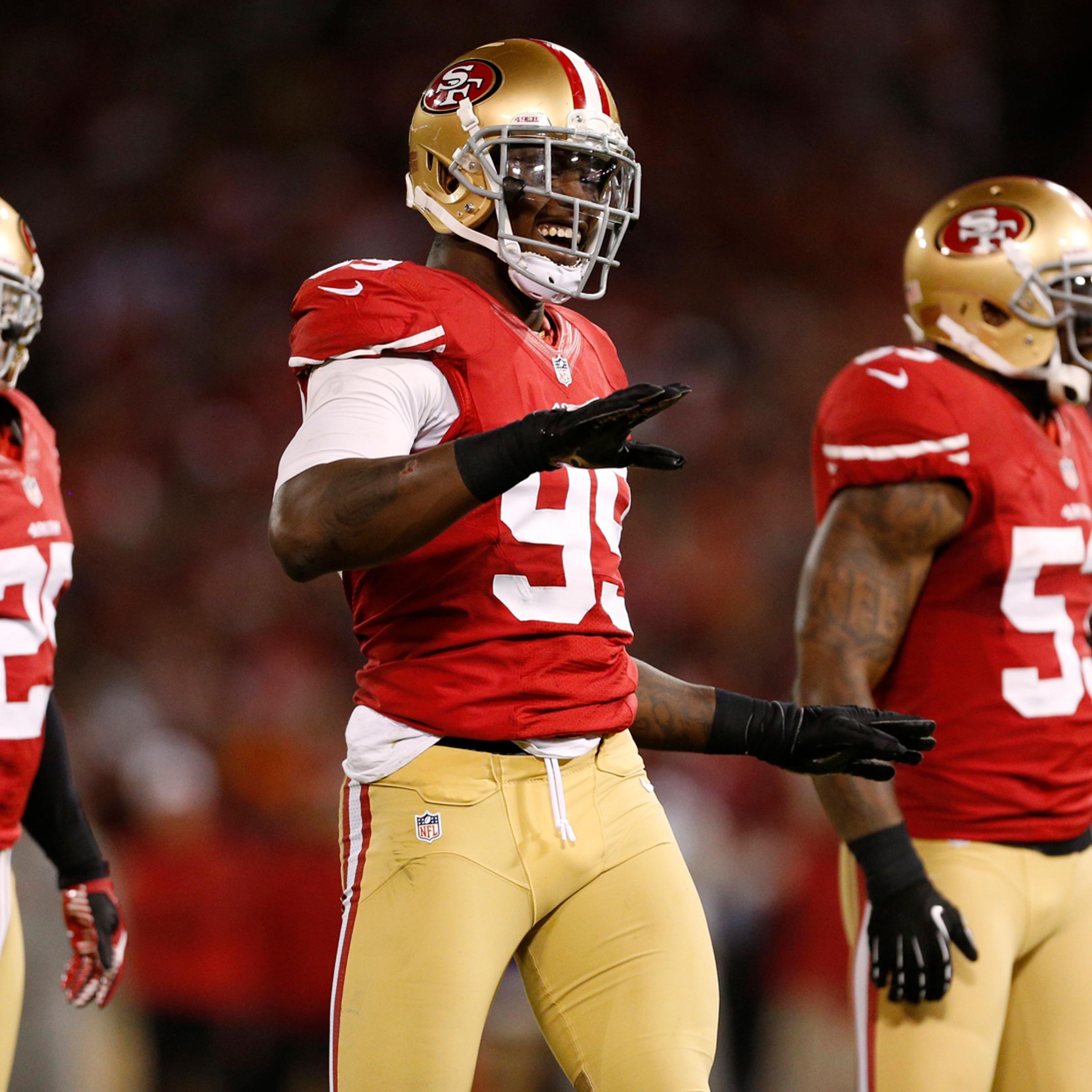 San Francisco 49ers outside linebacker Aldon Smith (99) reacts after sacking Chicago Bears quarterback Jason Campbell during the first half of their NFL football game San Francisco