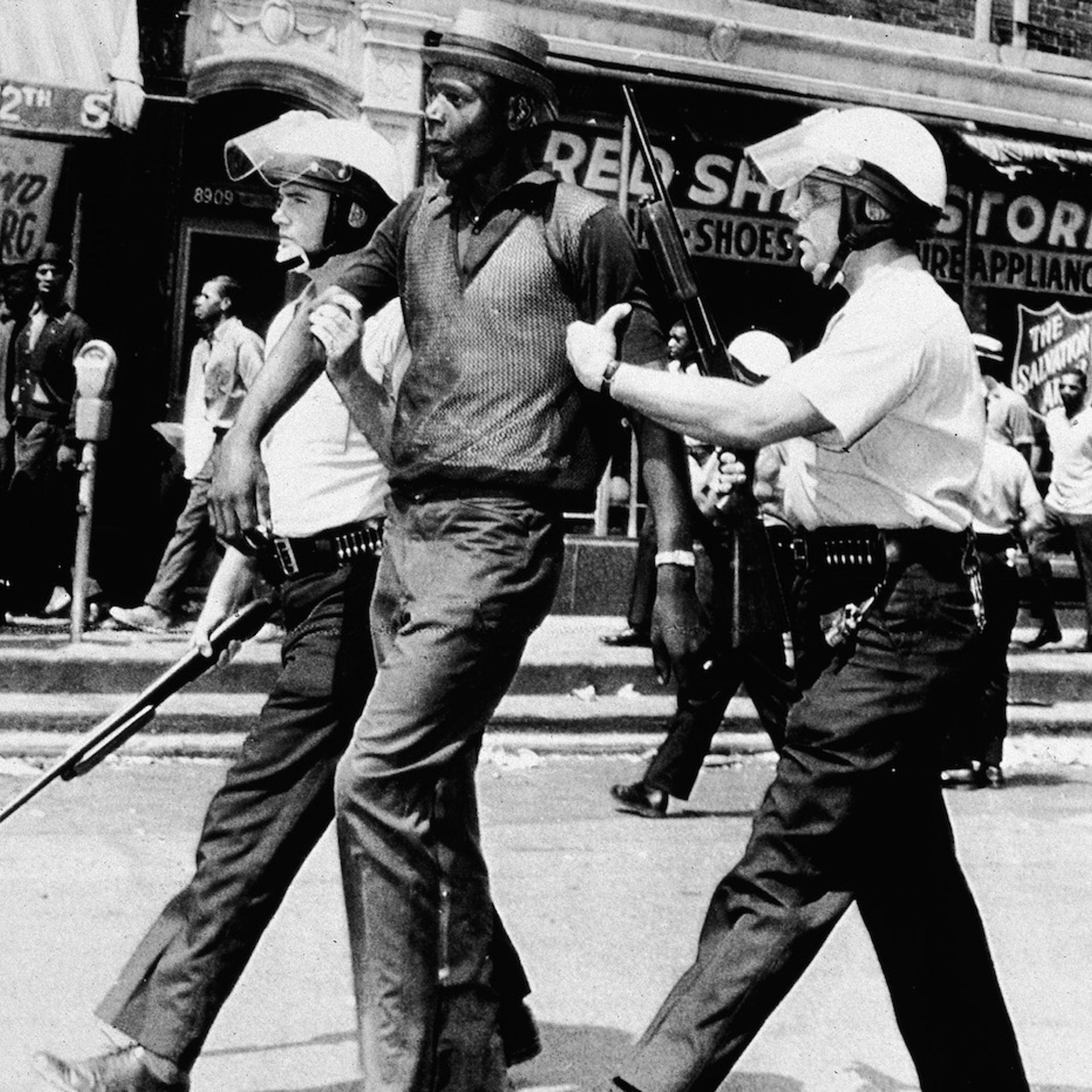 Police Arresting Black Man For Looting