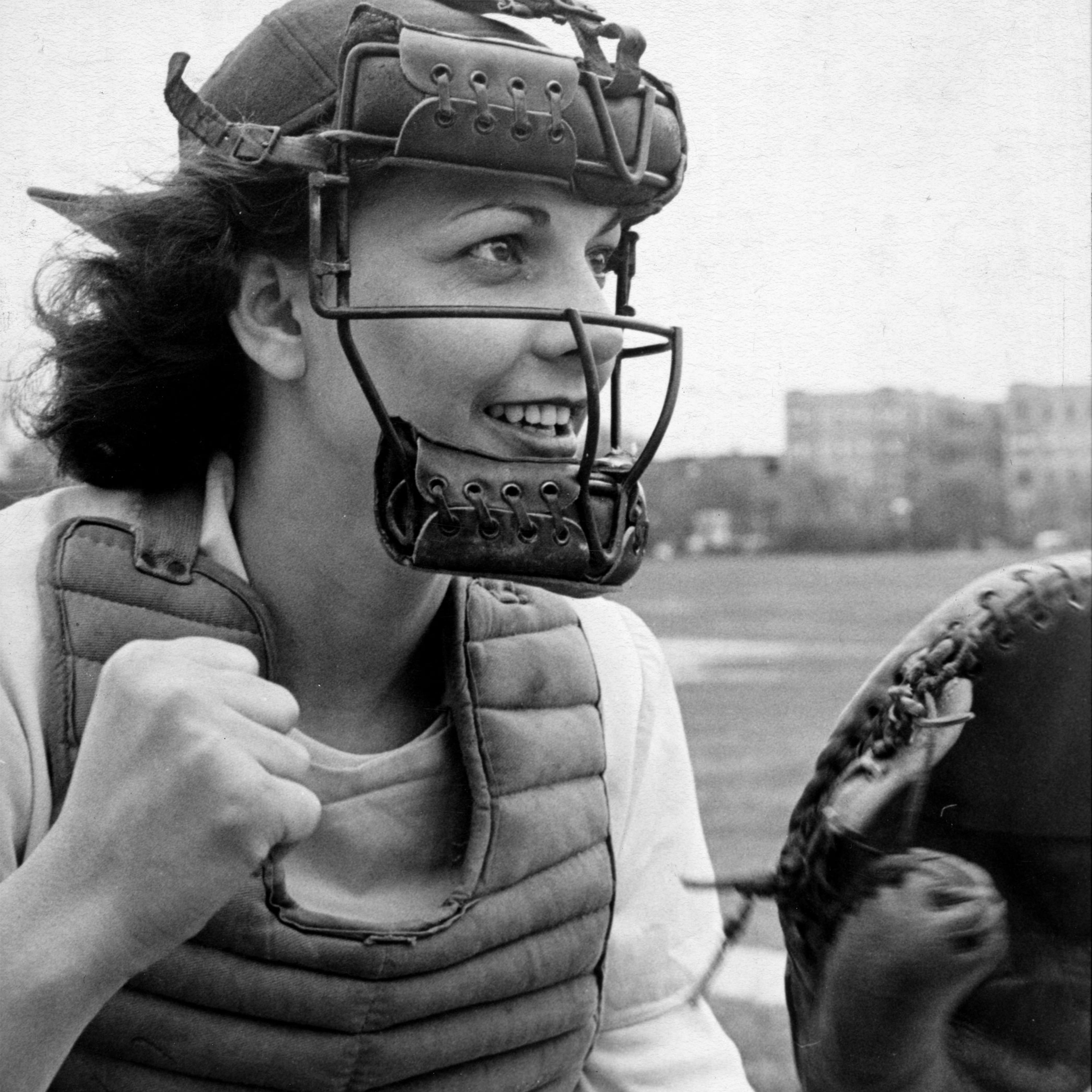 Catcher May "Bonnie" Baker of the South Bend Blue Sox has five brothers, four sisters, all of them catchers on Canadian ball teams. Bonnie once set a grade-school record by throwing a ball 345 feet. She also rides, swims and bowls.