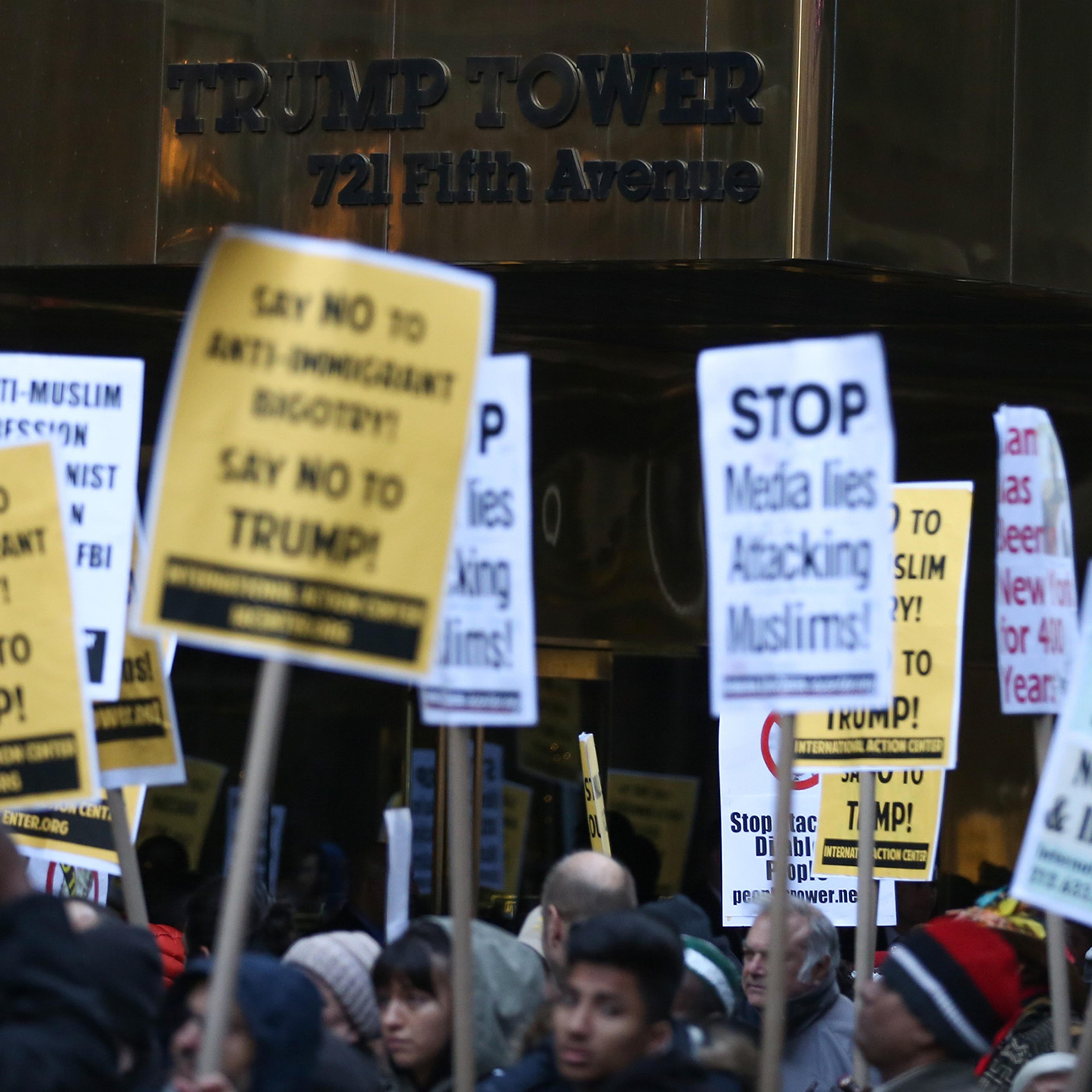 People stage a protest against Donald Trump after he made comments stating that he wants a 'total and complete shutdown of Muslims entering the United States' in front of the Trump Tower at 5th Avenue in New York City on Dec. 20, 2015.