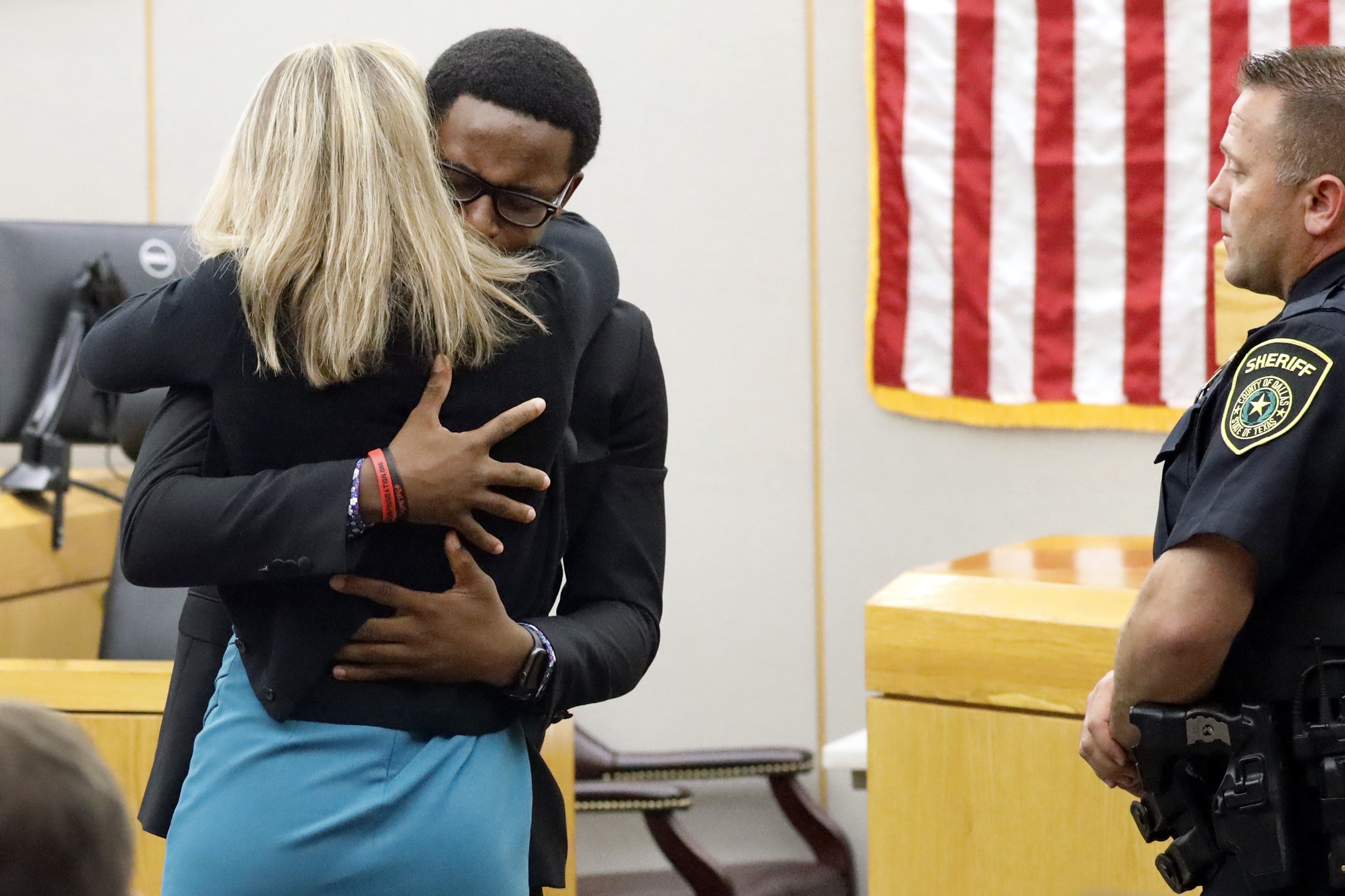 Botham Jean's brother hugs Amber Guyger