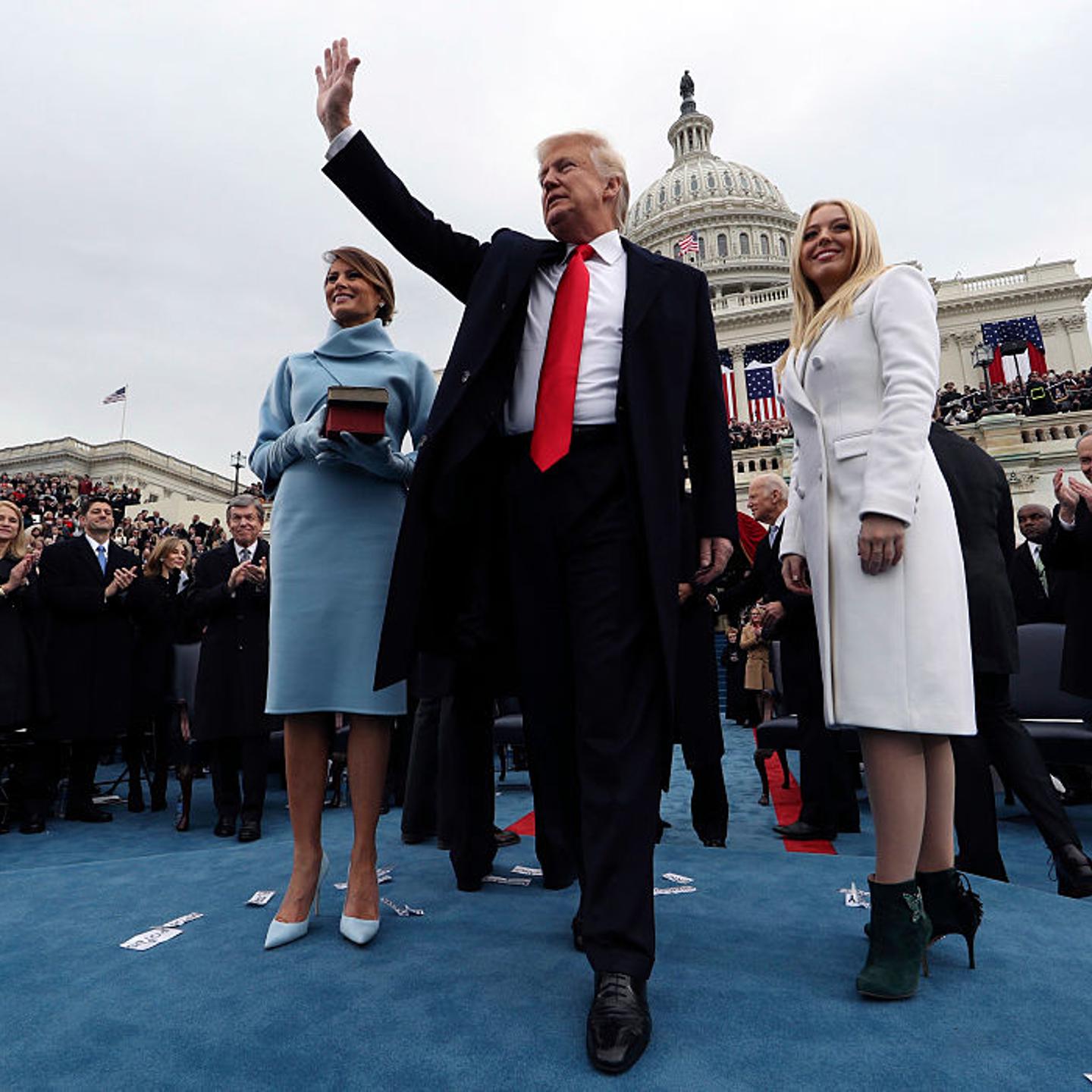 U.S. President Donald Trump acknowledges the audience after taking the oath of office as his wife Melania (L) and daughter Tiffany watch during inauguration ceremonies swearing in Trump as the 45th president of the United States on the West front of the