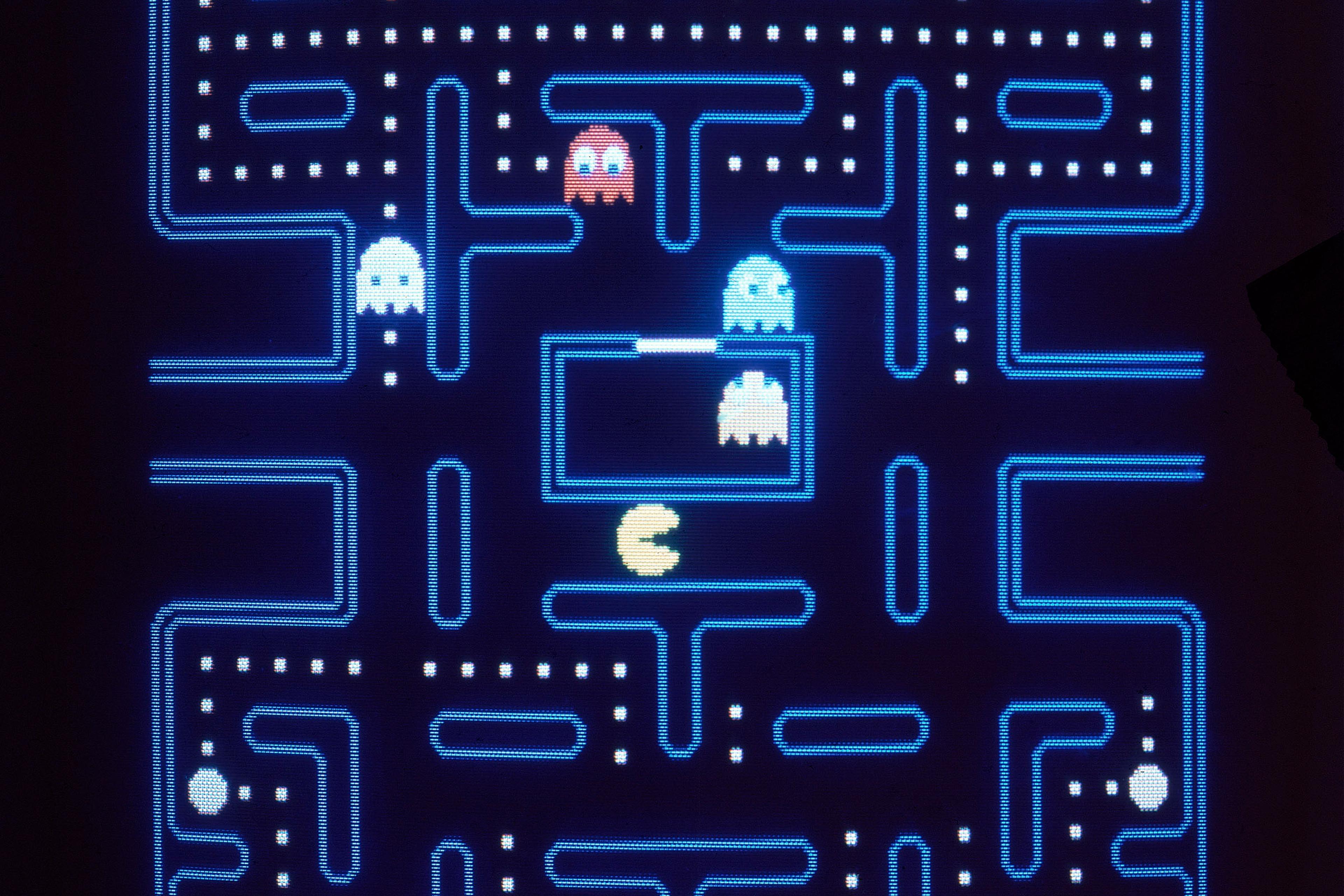 This close up view of a monitor shows the electronic video game Pac-Man in 1983.