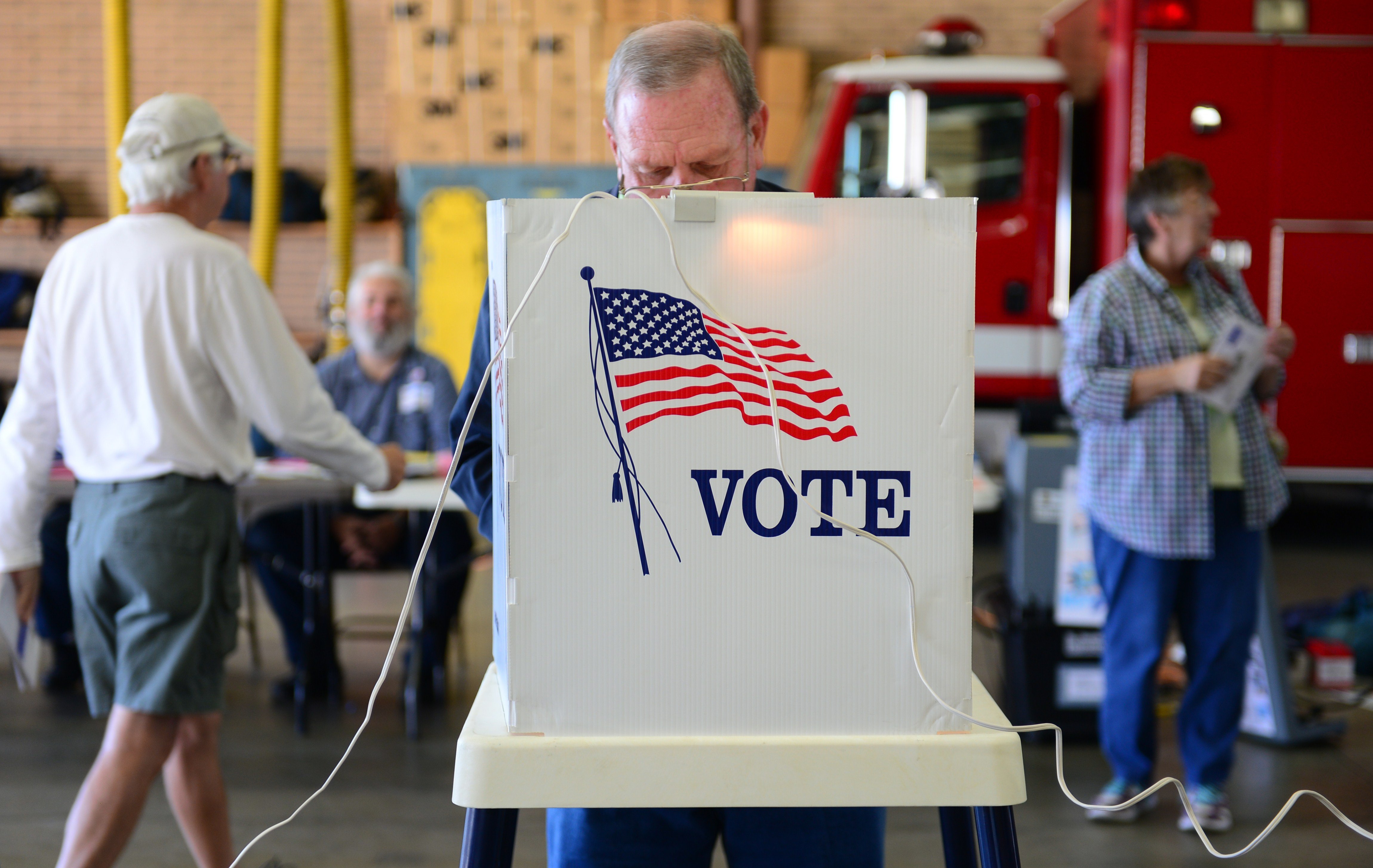 Voters cast their ballots at a polling station in Alhambra, Calif. on November 4, 2014.